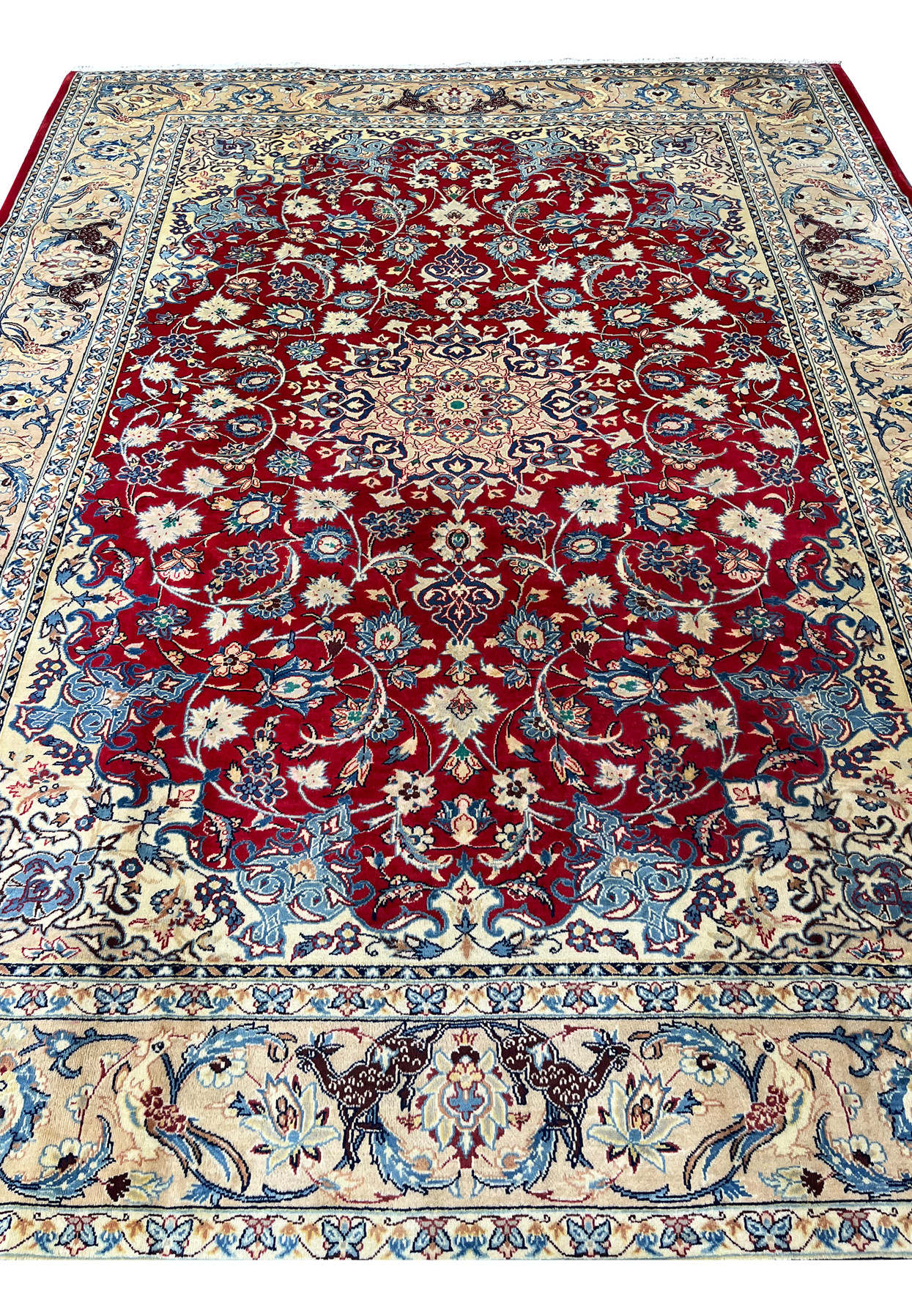 Midfield view 10x13 Persian Isfahan wool rug crimson red field ivory floral arabesques blue scrollwork animal border