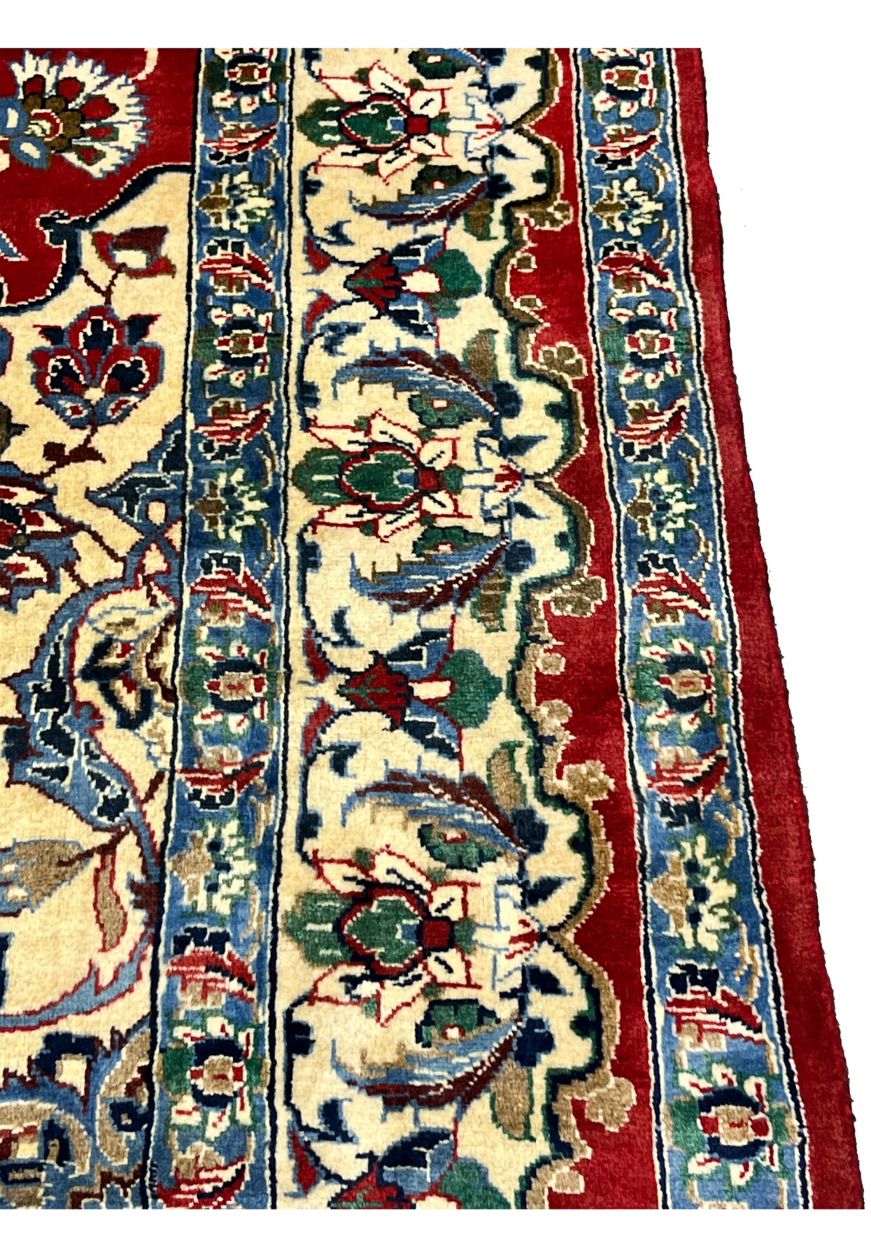 Side border detail 8x12 Persian Isfahan wool rug ivory ground green blue floral palmette scrollwork crimson red field