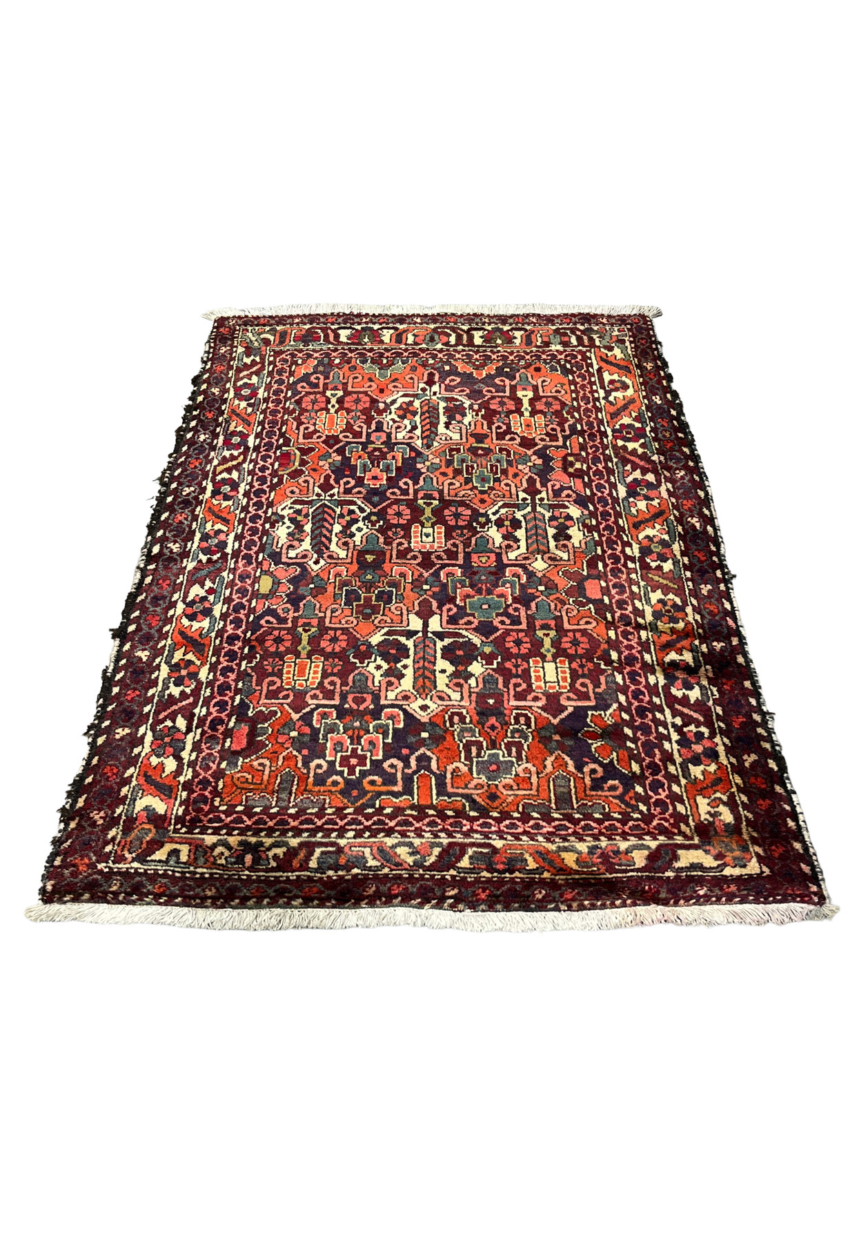 3'7"x5 antique Persian Bakhtiari wool rug laid flat, navy and orange allover floral pattern