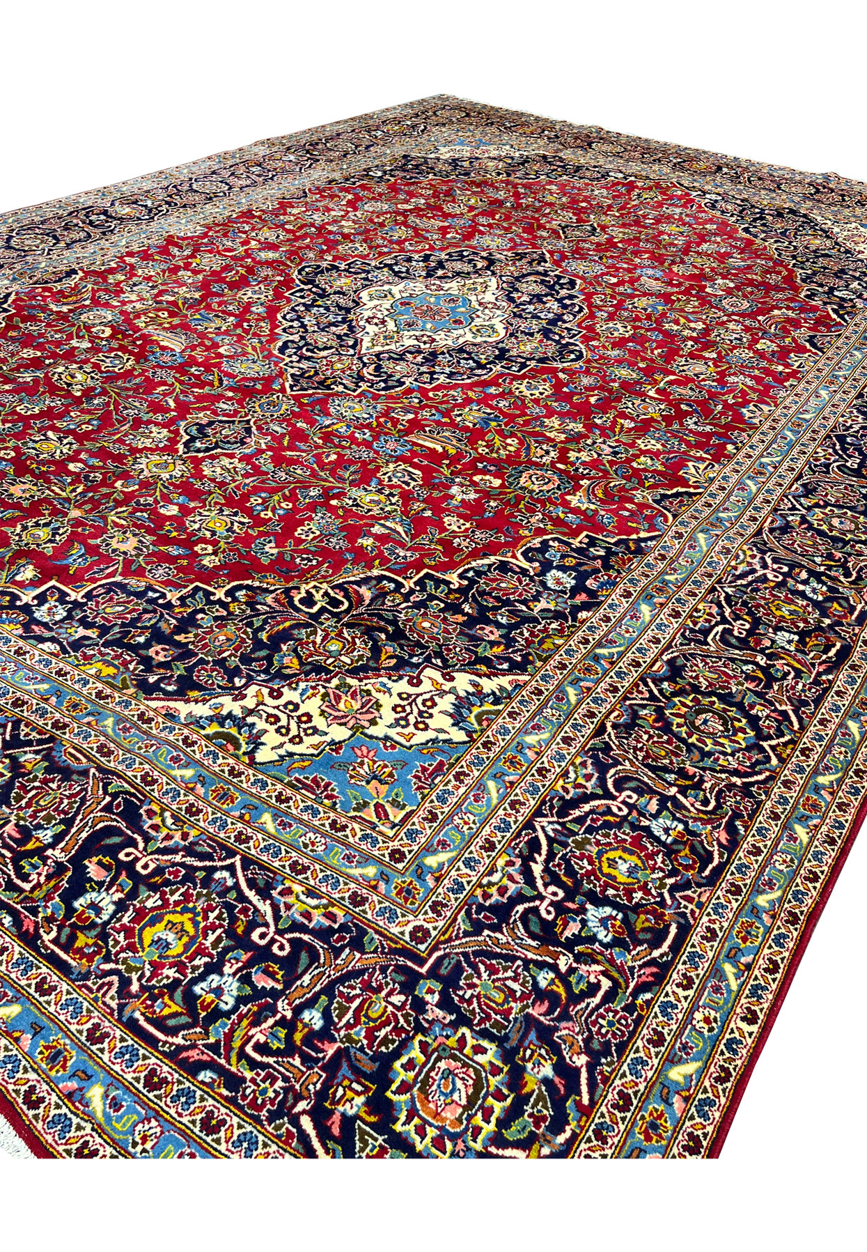 10x14'7 Persian Kashan rug featured on Shark Tank crimson navy medallion floral angled view