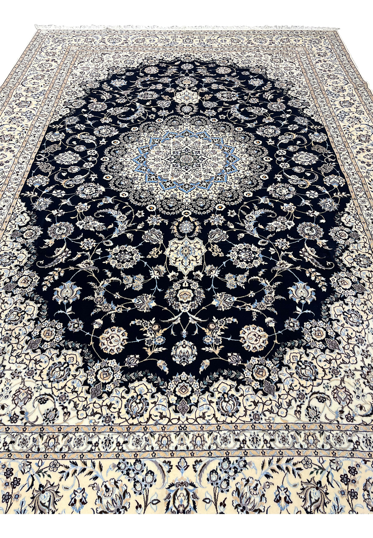 9x12 Persian Nain Habibian 6La rug midfield navy ground ivory medallion silk accents closeup
