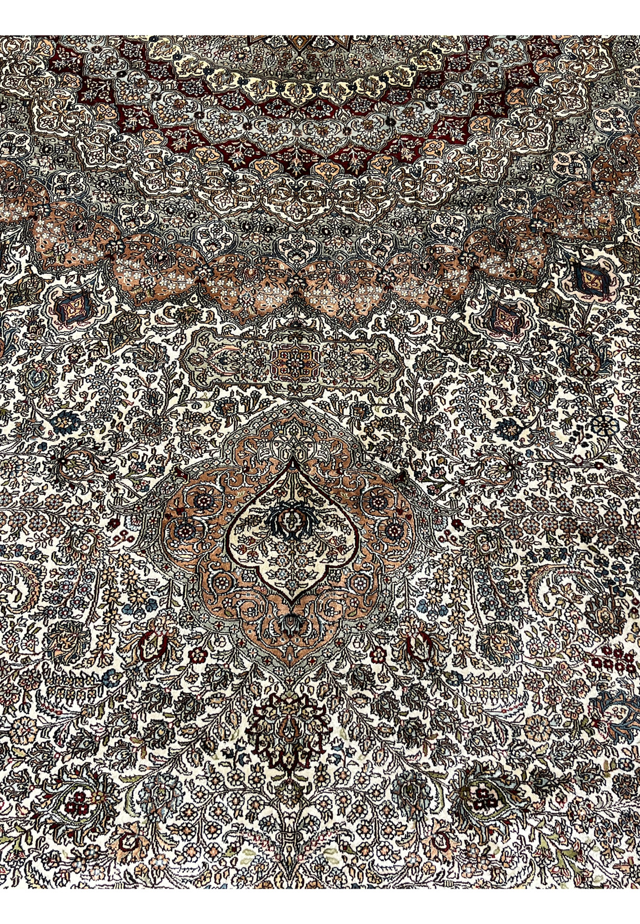 Classical Hereke floral motifs including palmettes rosettes arabesque vines and tiny polychrome blooms