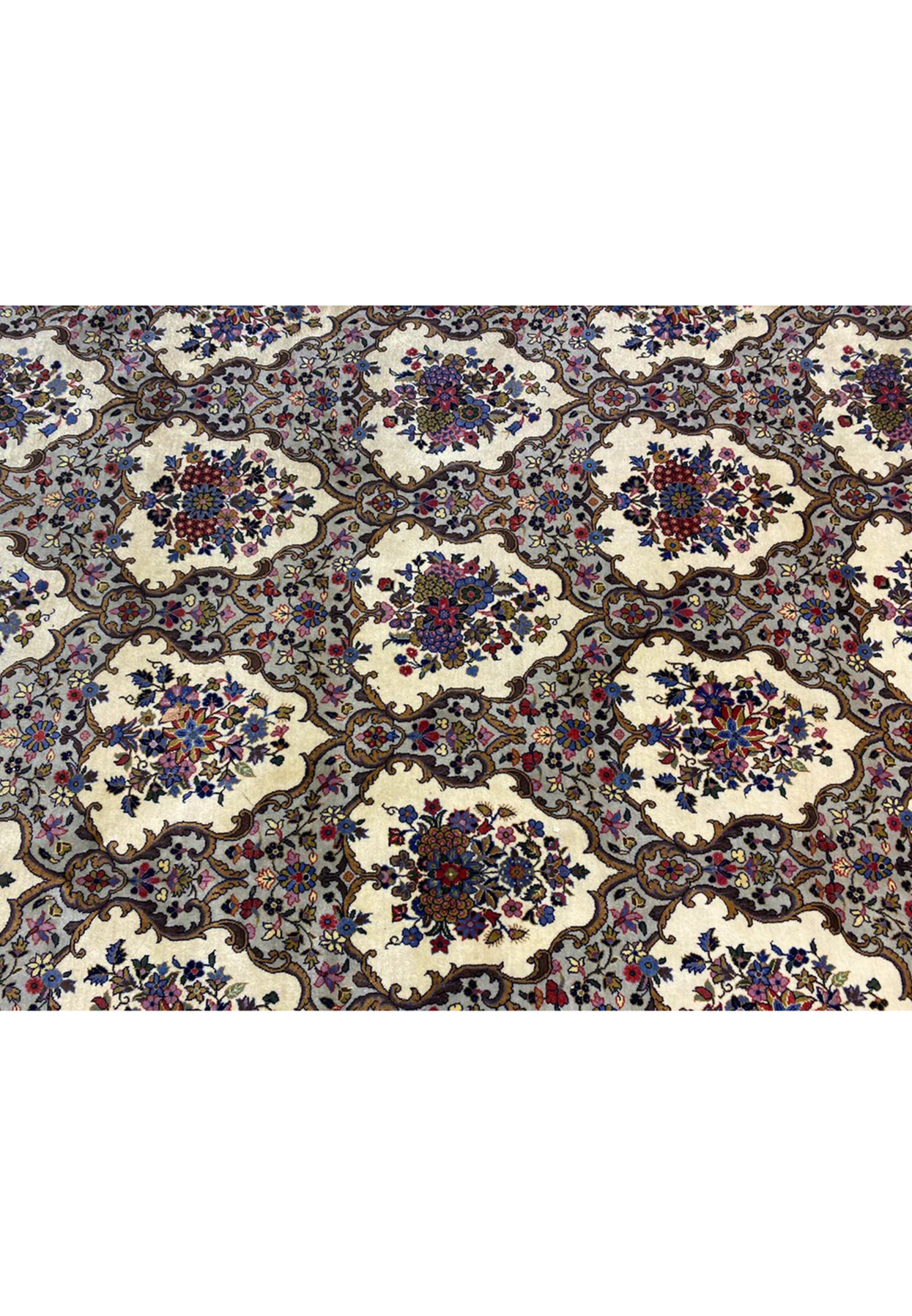 All-over kheshti panel design with floral cartouches and scrolling vines on ivory and grey ground