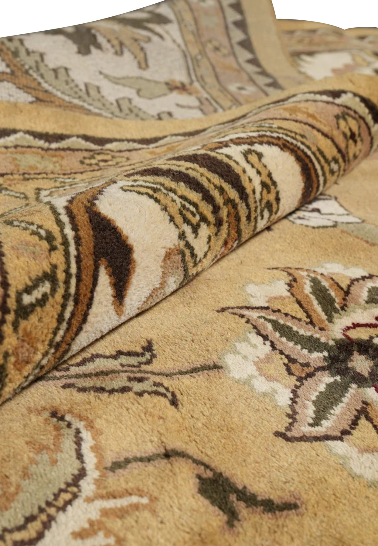 Rolled corner of this 12x18 Agra Soltanabad rug showing 0.4 inch wool pile and dense weave