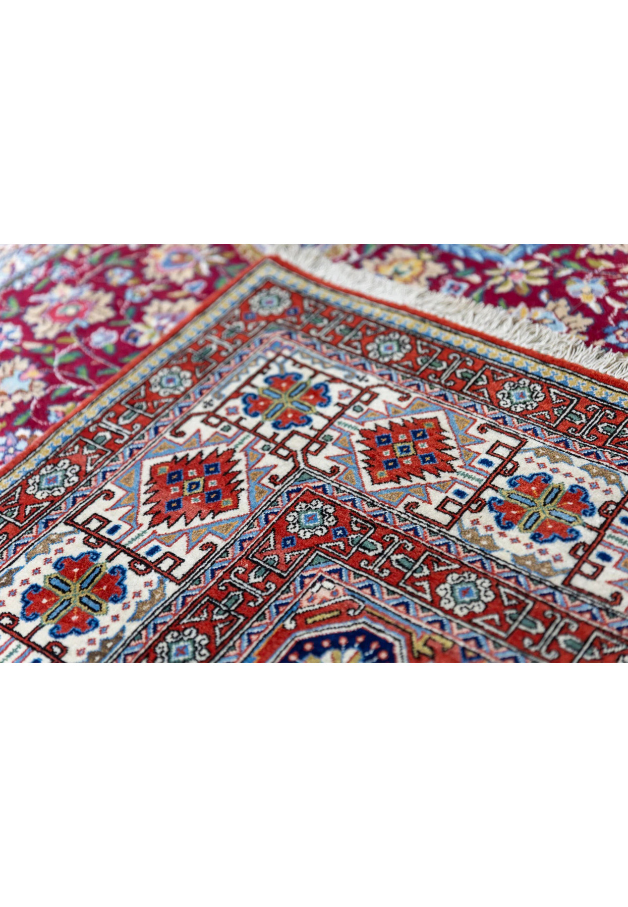 Backside of Persian Qum kork rug showing 400 KPSI hand-knotted weave density and clean weave structure