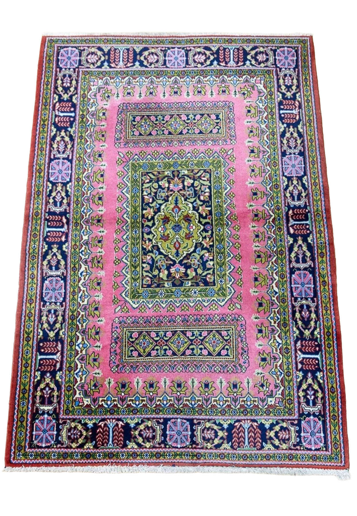 Vintage Persian Qum kork rug top view showing pink field, chartreuse green panels, and navy willow tree border