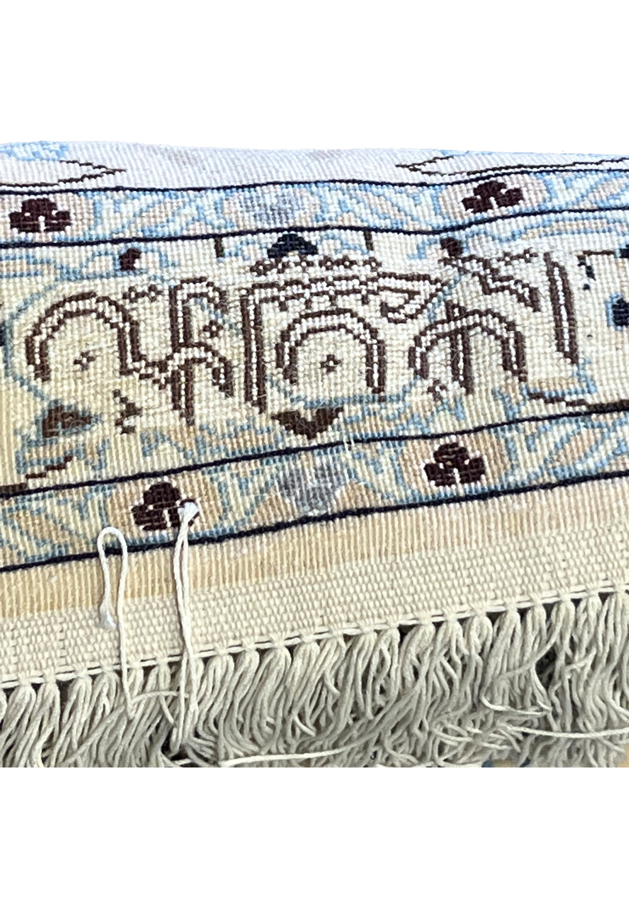 Reverse view of Habibian signature on authentic master-signed Persian Nain rug, woven in Farsi