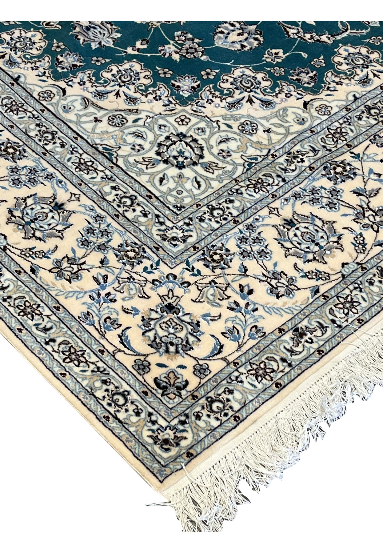 Corner detail of authentic Persian Nain rug with ivory main border and navy guard stripes