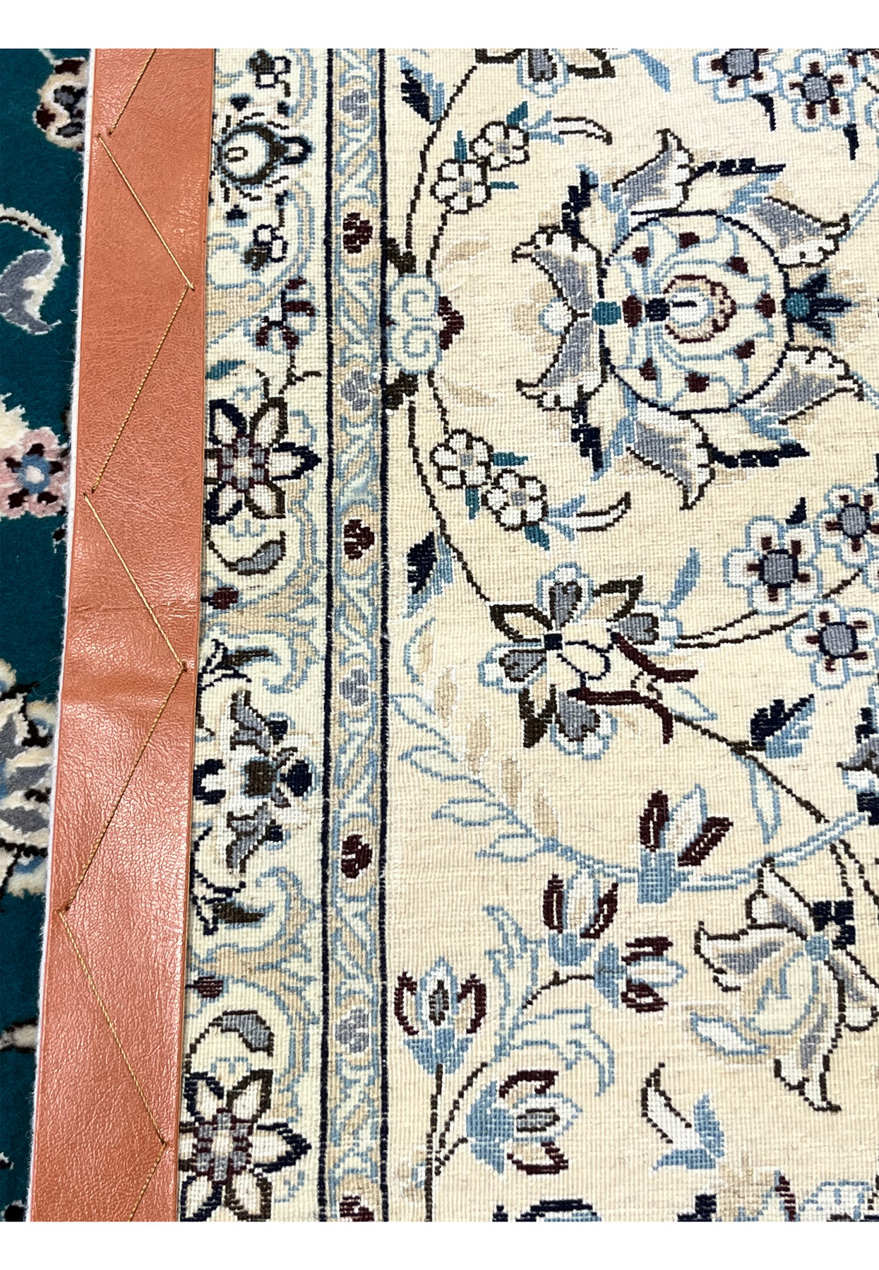 Backside of hand-knotted Persian Nain 6 La rug showing fine 550-600 KPSI knot structure clarity