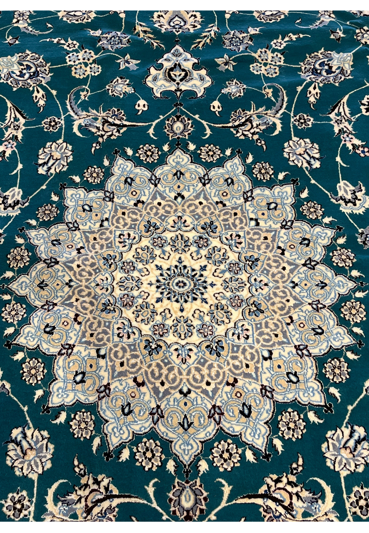 Ivory and pale blue star medallion at center of hand-knotted Persian Nain 6 La master rug