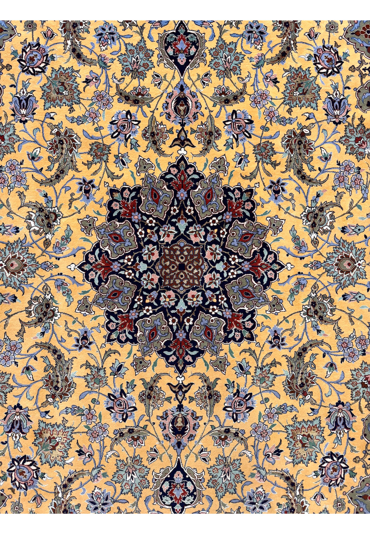 Midfield detail of master Haghighi Isfahan rug showing scrolling vines, paisleys, and silk-woven flowers
