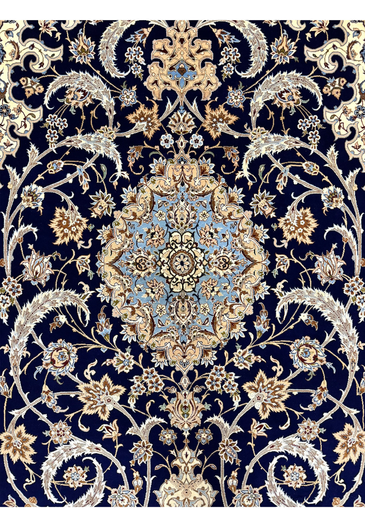 Central medallion closeup of master Isfahan rug with light blue ground, ivory floral filigree, and silk inlay
