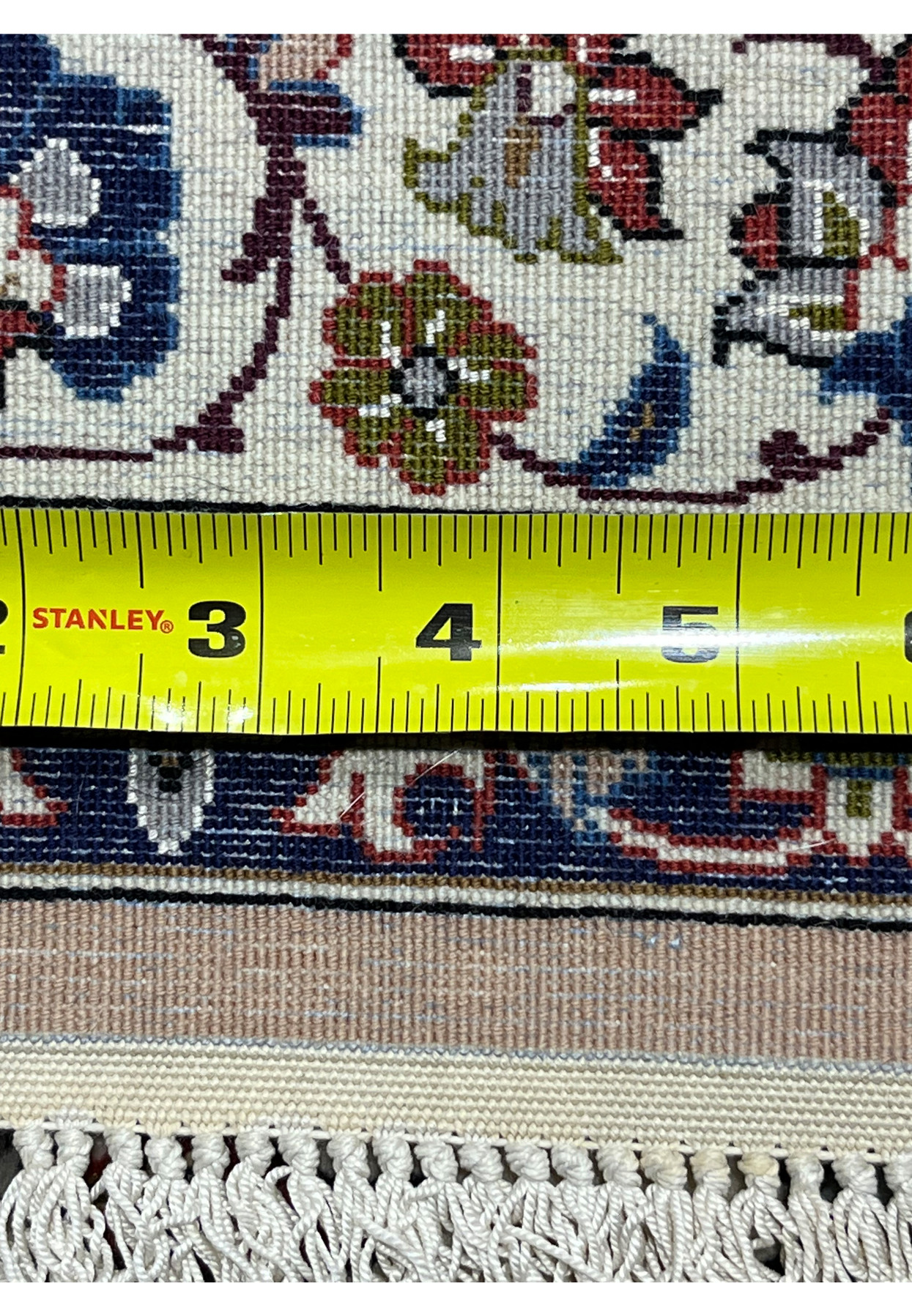 Backside with tape measure documenting the 500 KPSI knot density of this signed Isfahan piece