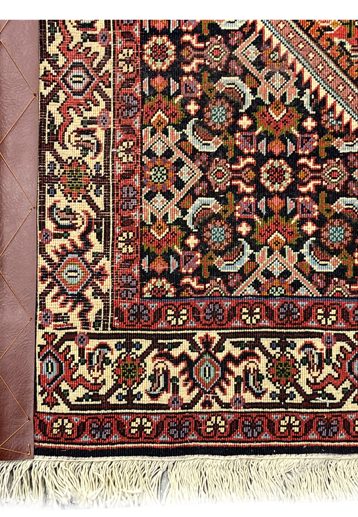 Reverse side of the Bijar revealing the tight cotton foundation and crisp Mahi pattern definition