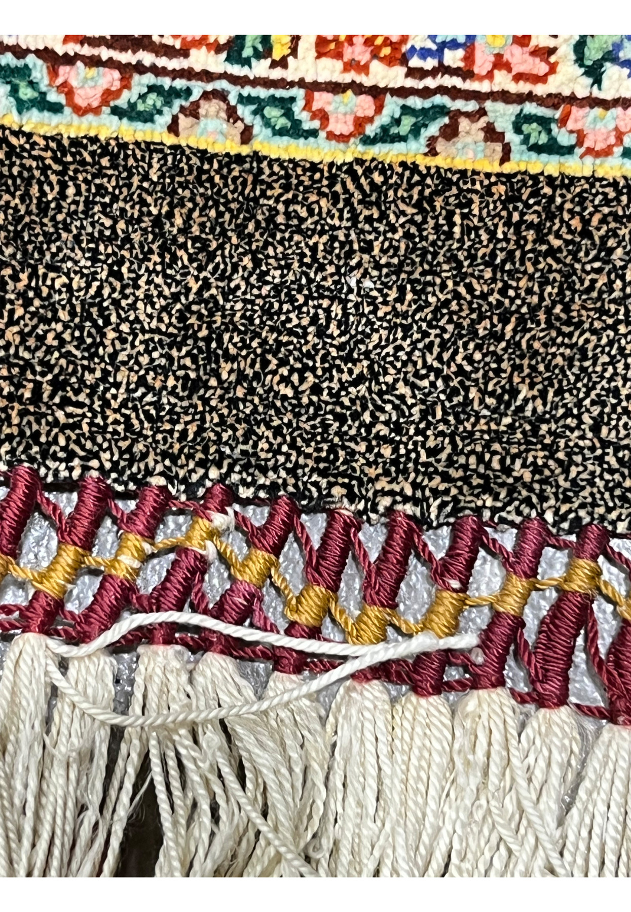 Distinctive multicolor cream and turquoise silk fringe finishing characteristic of Gholbafan workshop