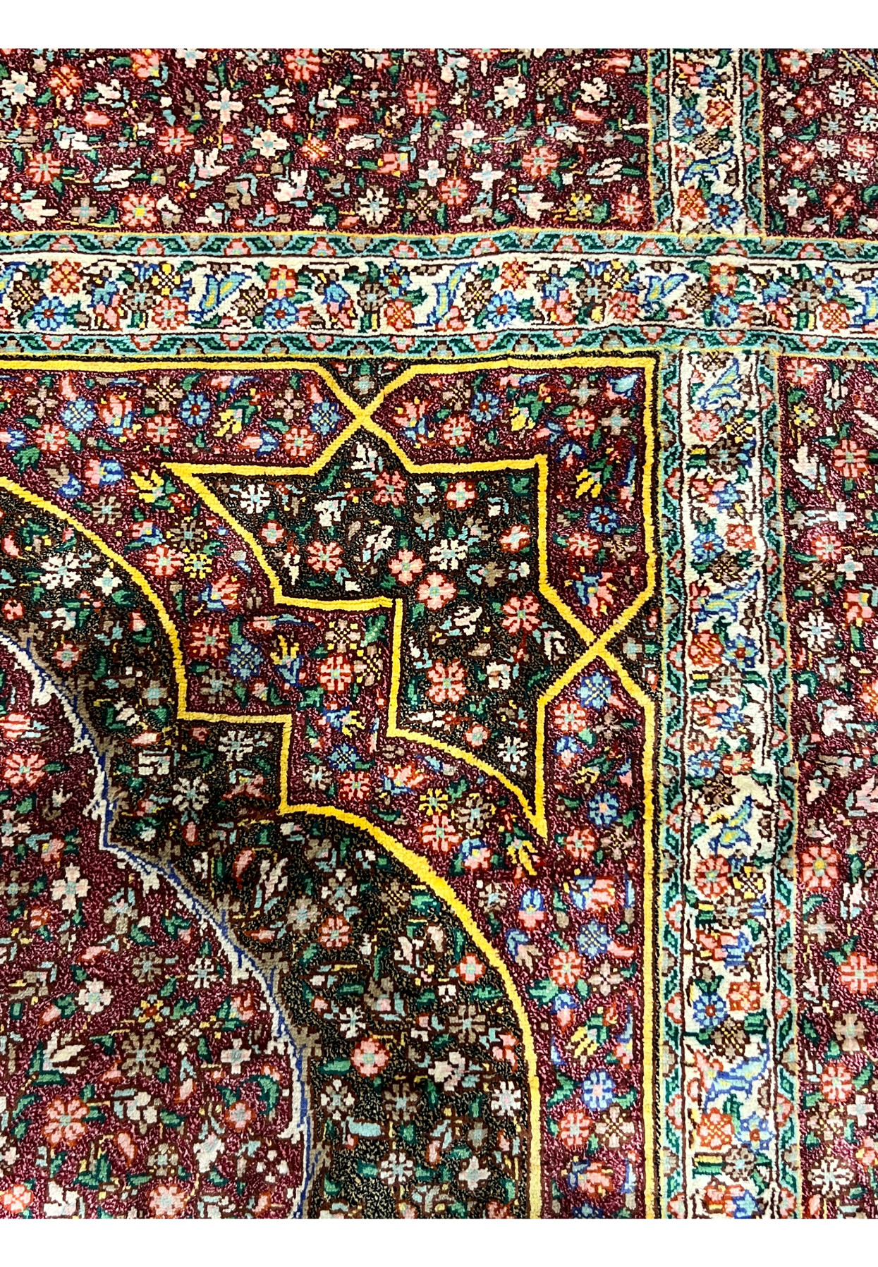Foundation closeup revealing the pure silk warp and weft structure of this fine Qum piece