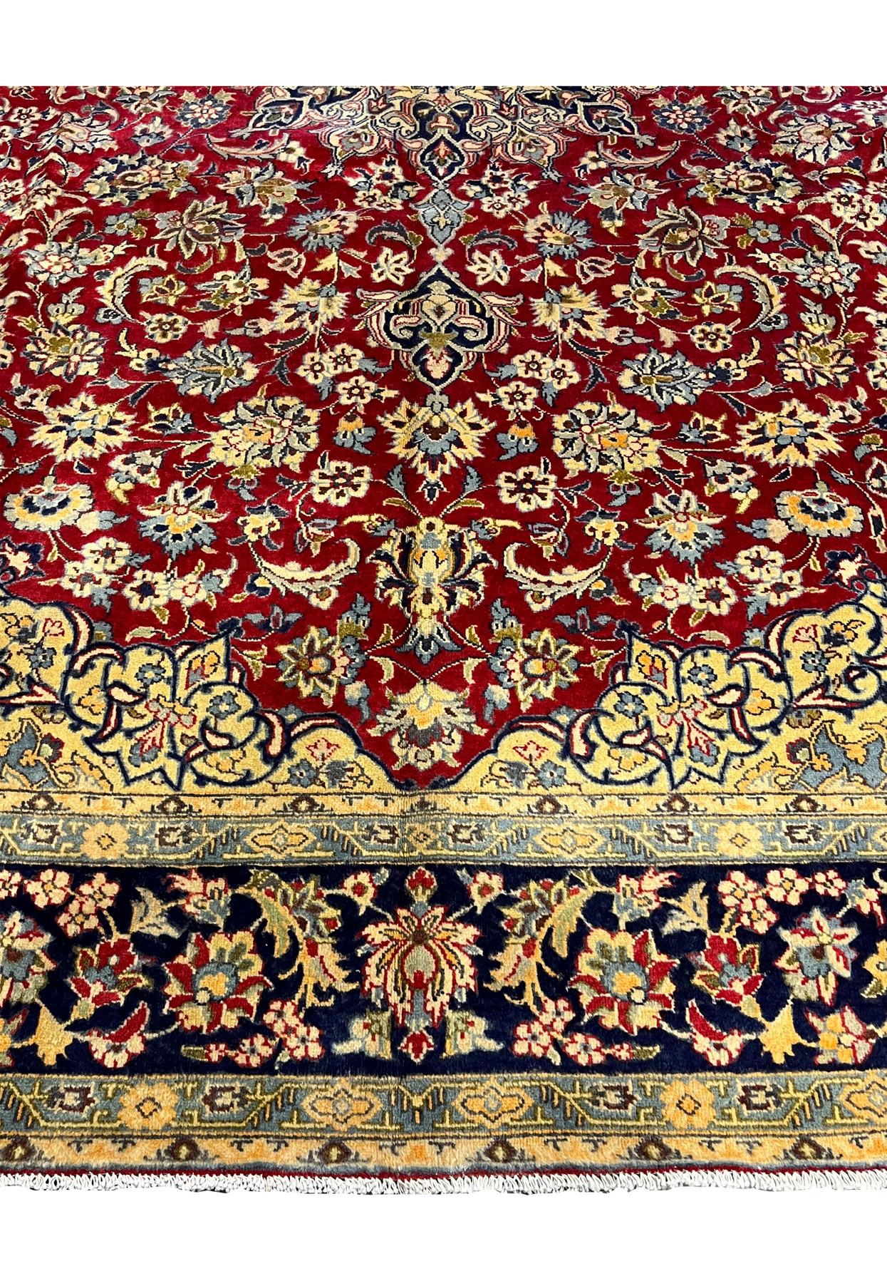 Full overhead view of the 8x14 gallery-size Isfahan showing the centered medallion and balanced corner composition