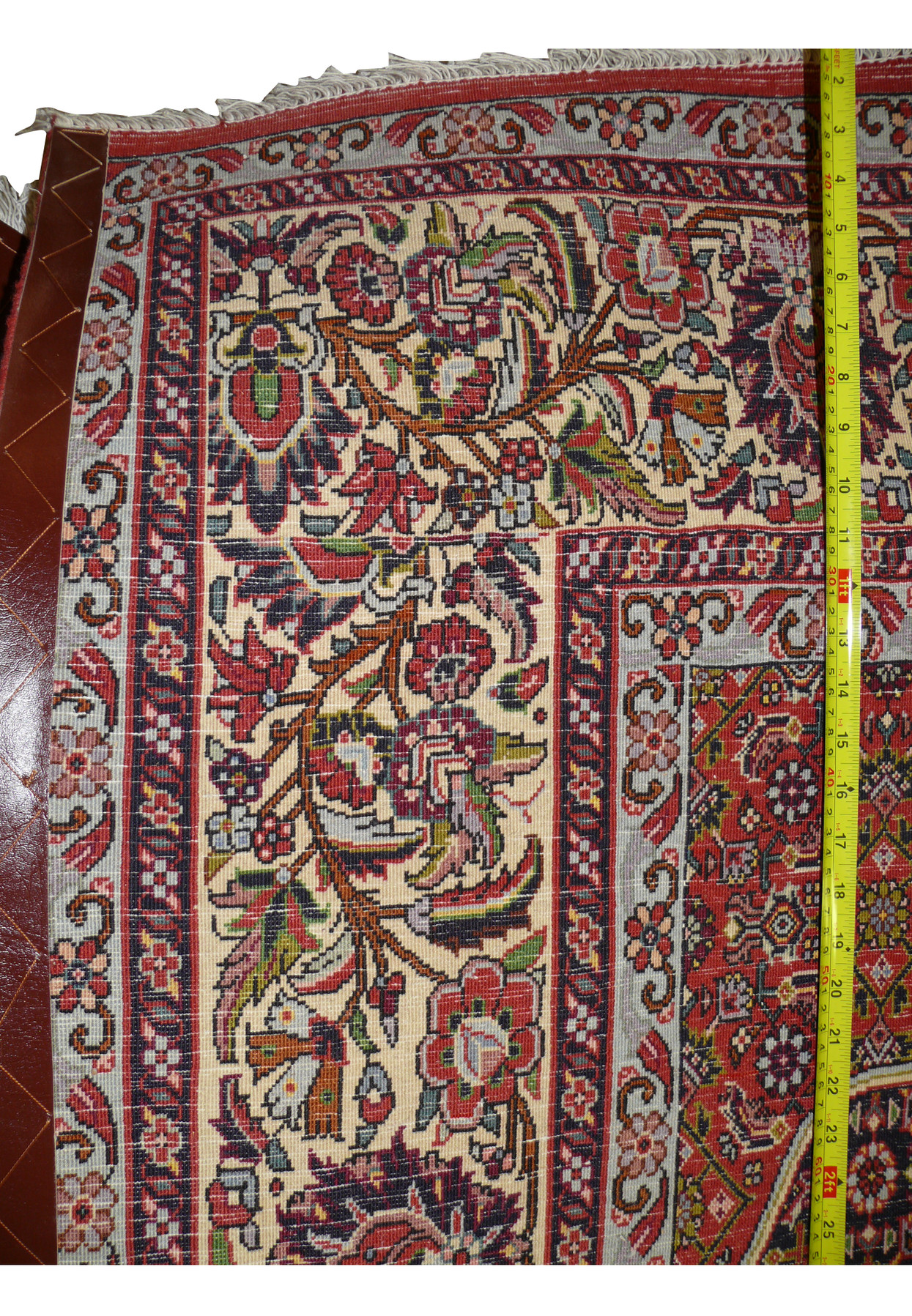 Backside view of hand-knotted Persian Bijar rug with measuring tape confirming dense weave structure