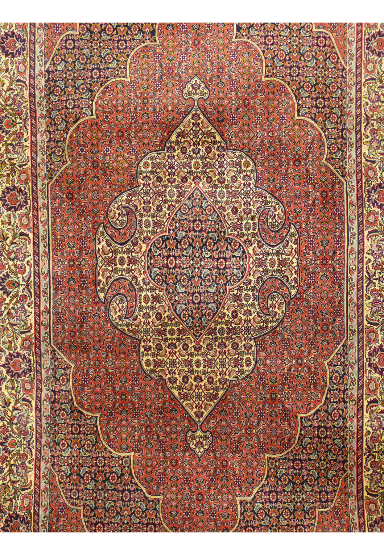 Close-up of three-layer scalloped medallion on Persian Bijar rug with cypress scrolls and dense herati pattern