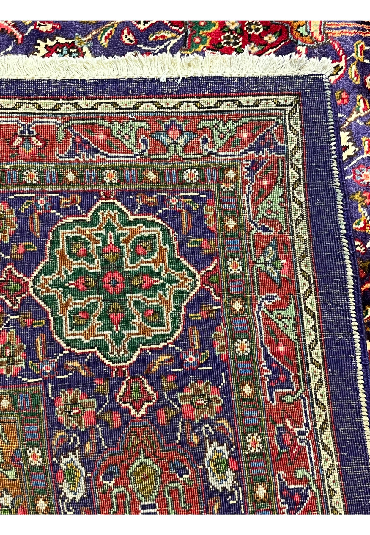 Backside view of authentic Persian Tabriz rug showing crisp design clarity and even hand-knotted weave