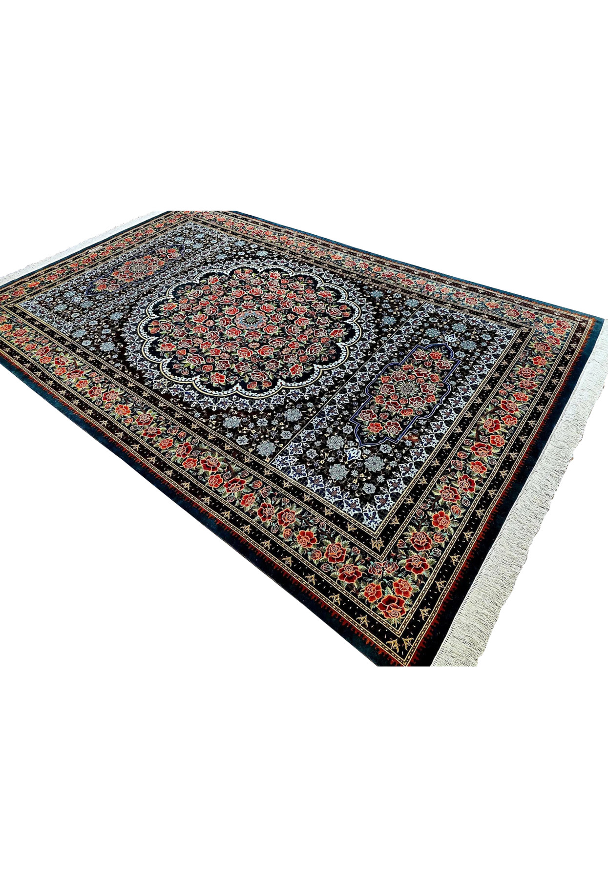 Angled studio view of signed Mohseni Qum pure silk rug highlighting jewel toned roses and silk sheen across the pile