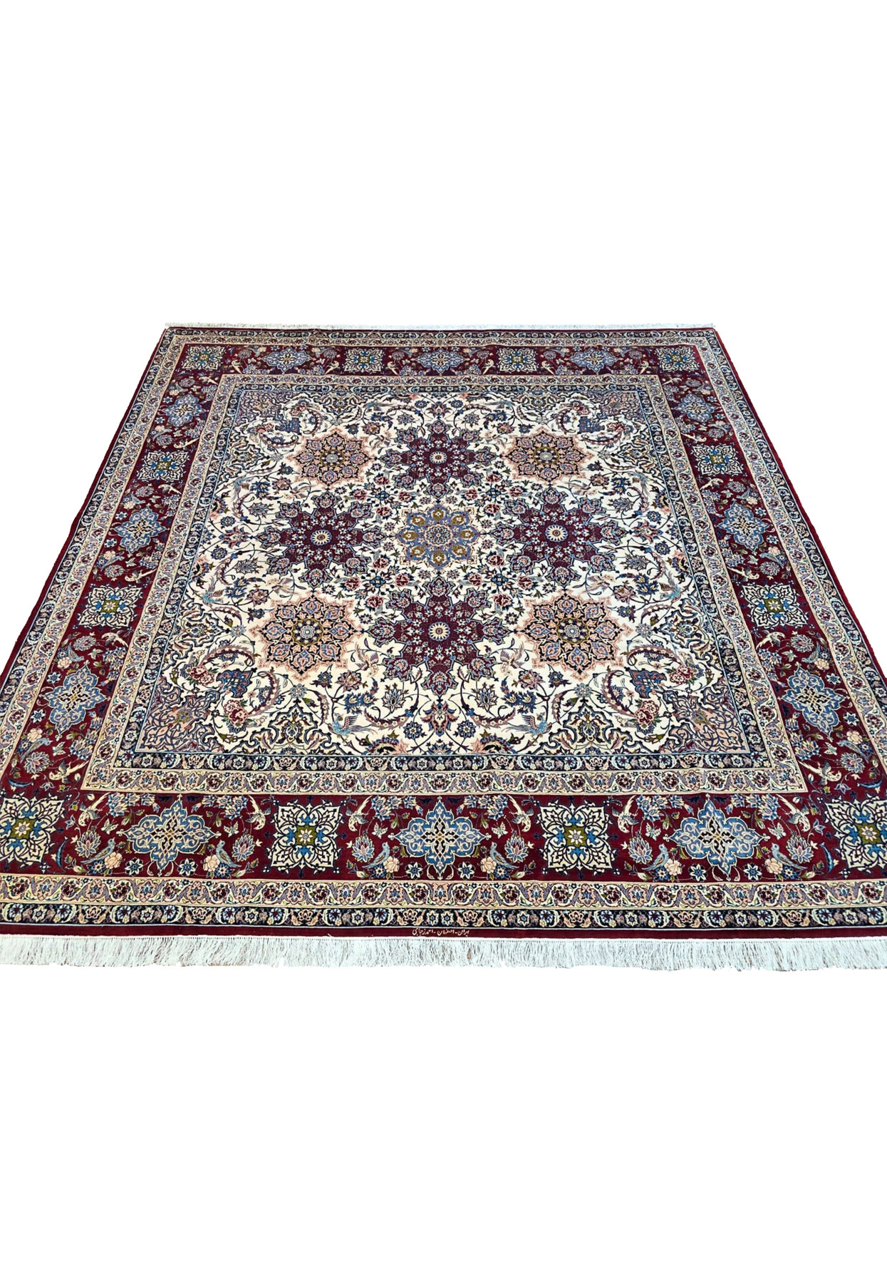 Authentic 700 KPSI square Persian Isfahan rug photographed flat showing ivory field, ruby border, navy outlines