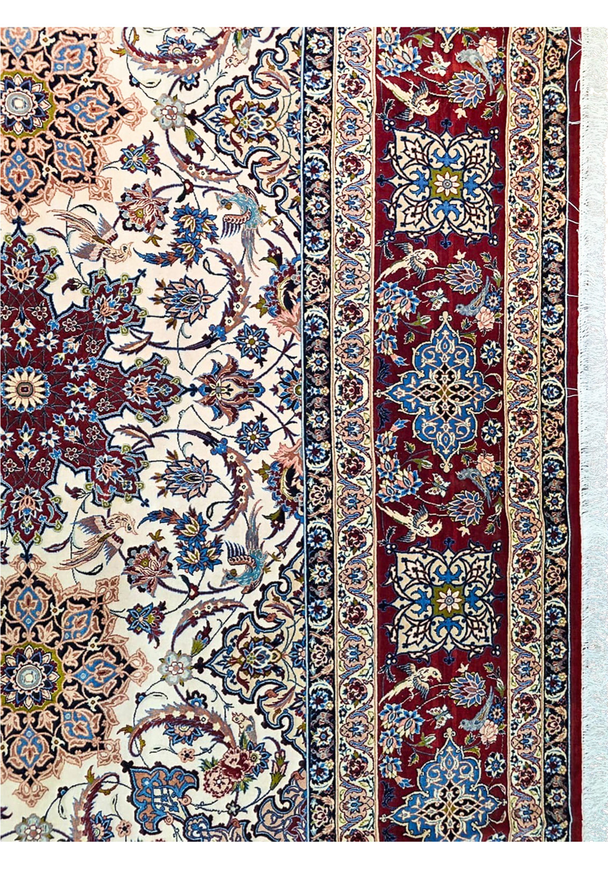 Border closeup of signed Zojaji Isfahan with bird and flower cartouches on deep ruby red ground and ivory guard