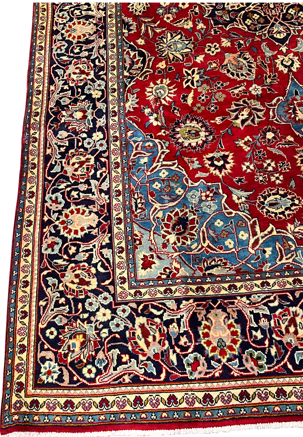 Edge detail of 8x13 Najafabad rug, navy main border with ivory palmette cartouches and twin ivory vine guards