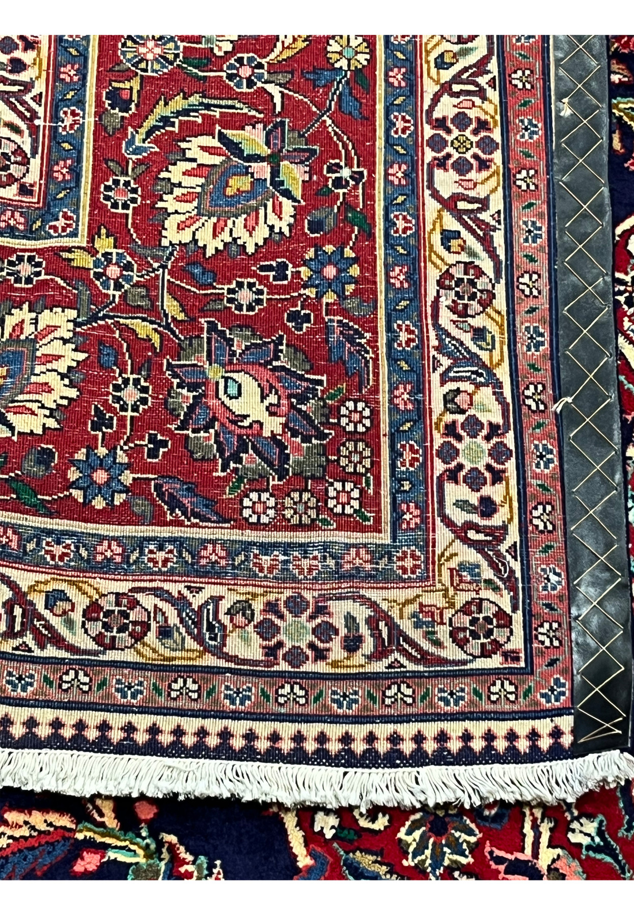 Backside view of Persian Qum kork wool rug showing fine knot grid, cotton foundation, and 280 to 300 KPSI density