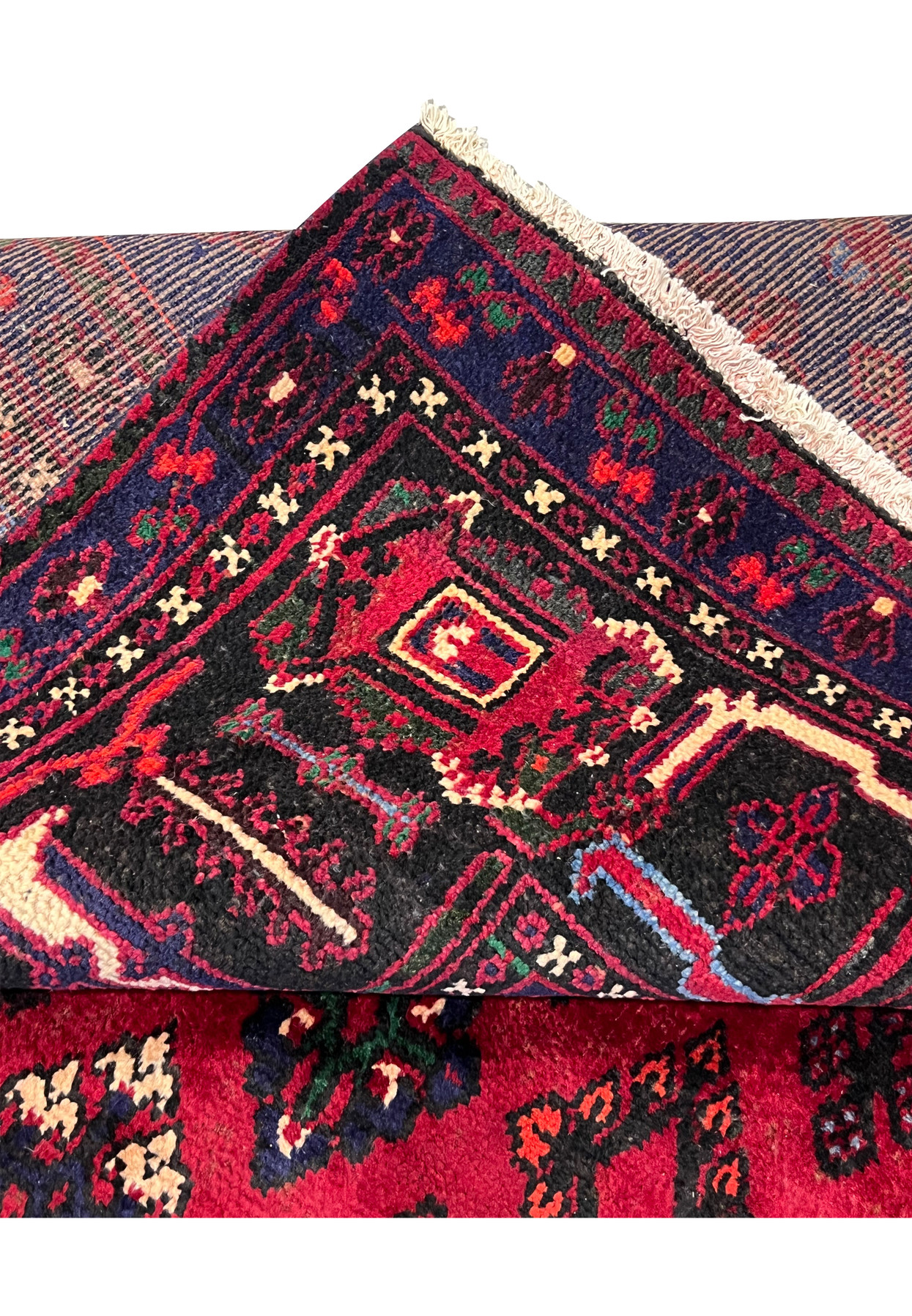 Folded-edge view of authentic Persian Meymeh, deep navy main border, hand-knotted wool on cotton, for dining room