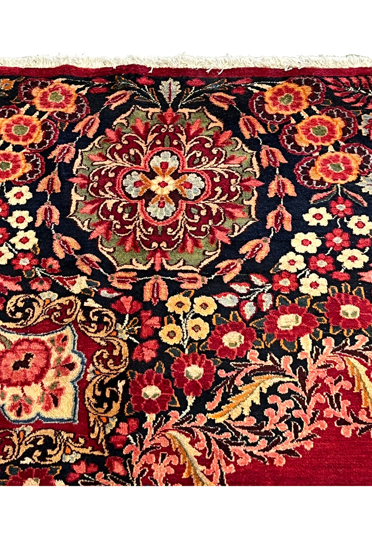 Pattern close-up of antique signed Moud rug, ivory medallion meeting deep red field, fine workshop drawing pre-revolution