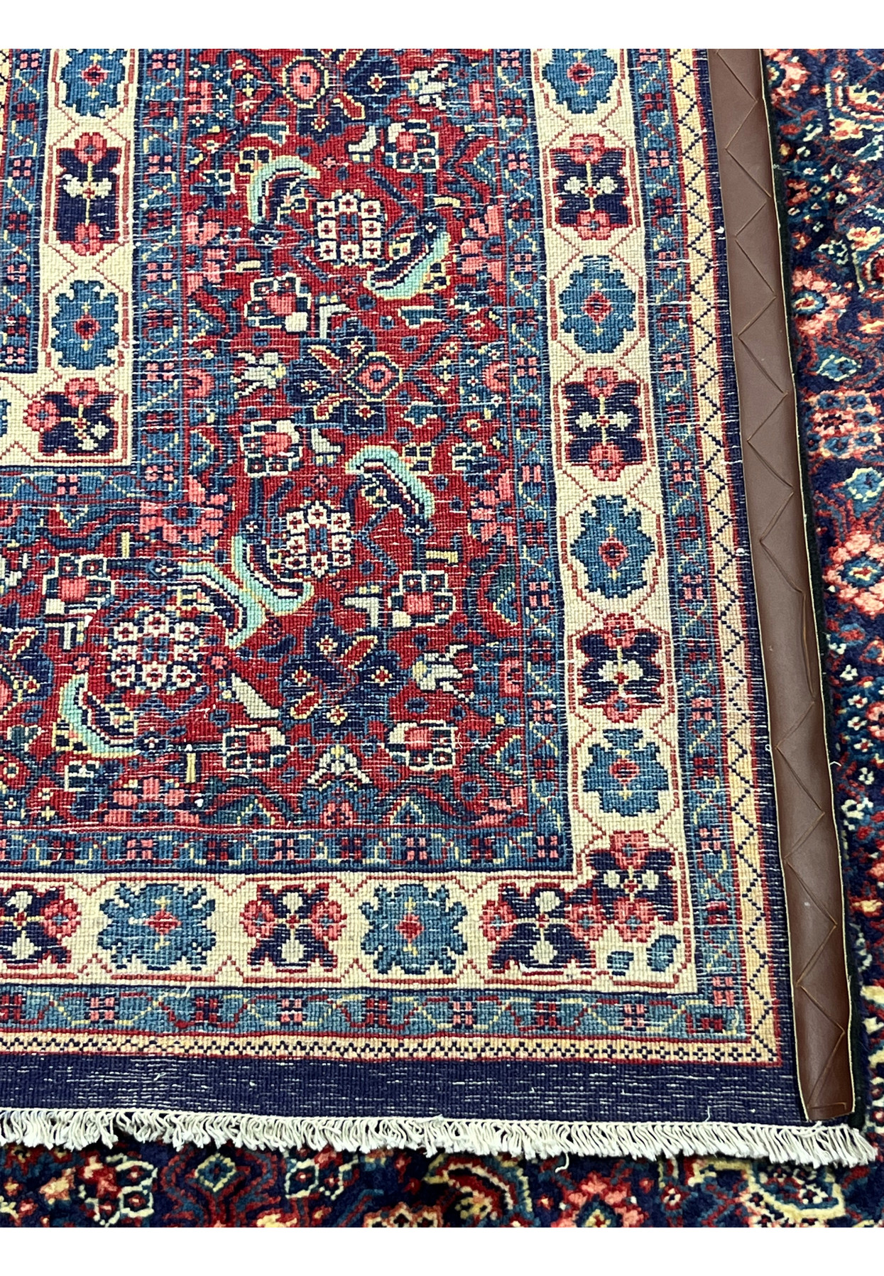 Backside of Persian Sarough rug, tightly woven wool foundation and fine knot detail, authentic 220 to 240 KPSI handmade workshop quality