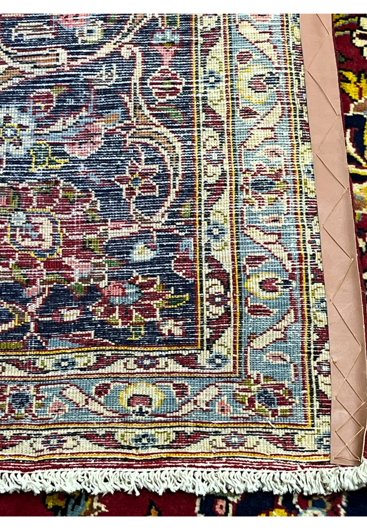 Backside of Persian Kashan rug, tightly woven cotton foundation and clean knot detail, authentic Kashan workshop production