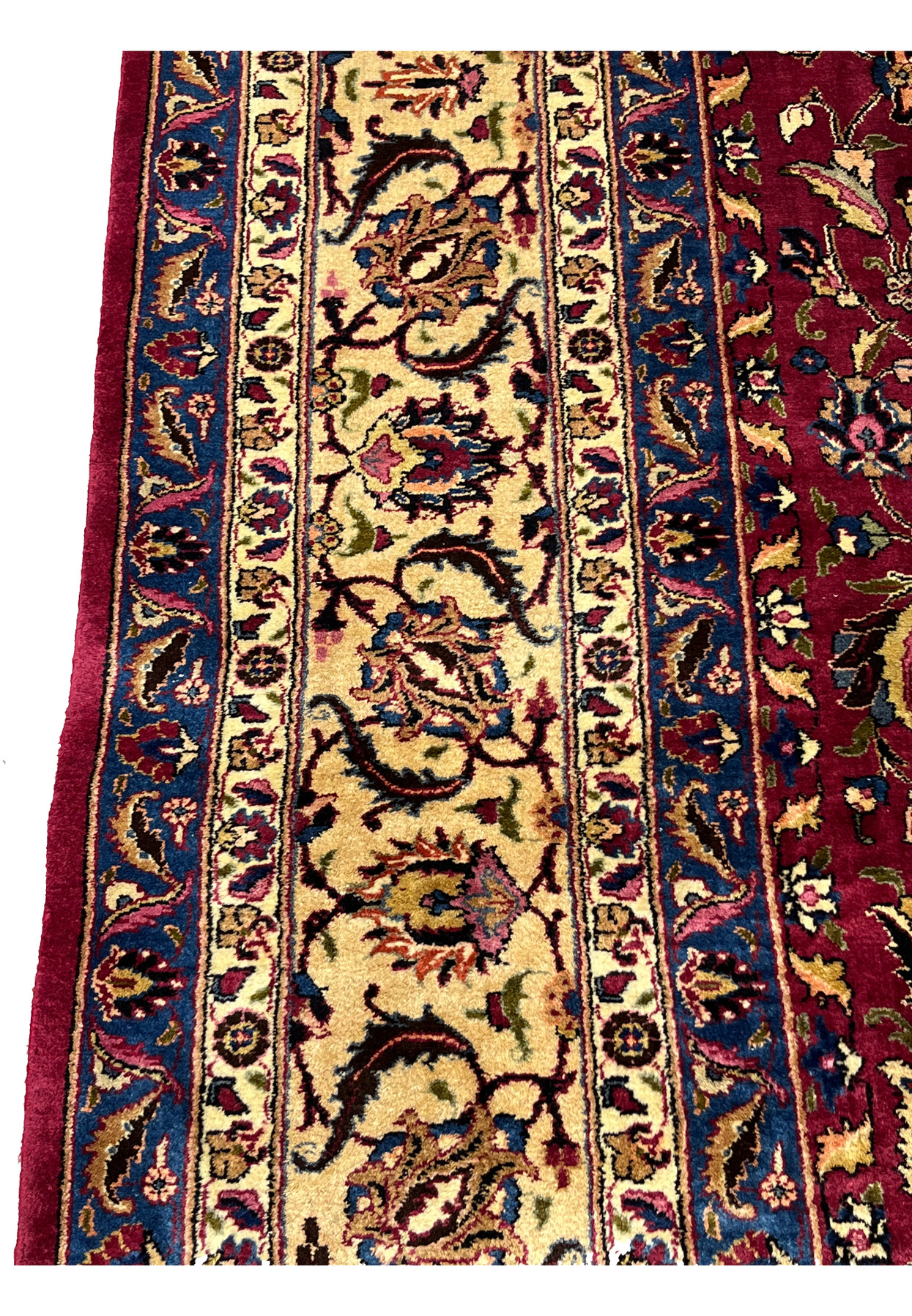 Border closeup Persian Mashad rug, palmette and saz leaf motifs in red and navy on gold ground, fine wool on cotton handmade in Persia