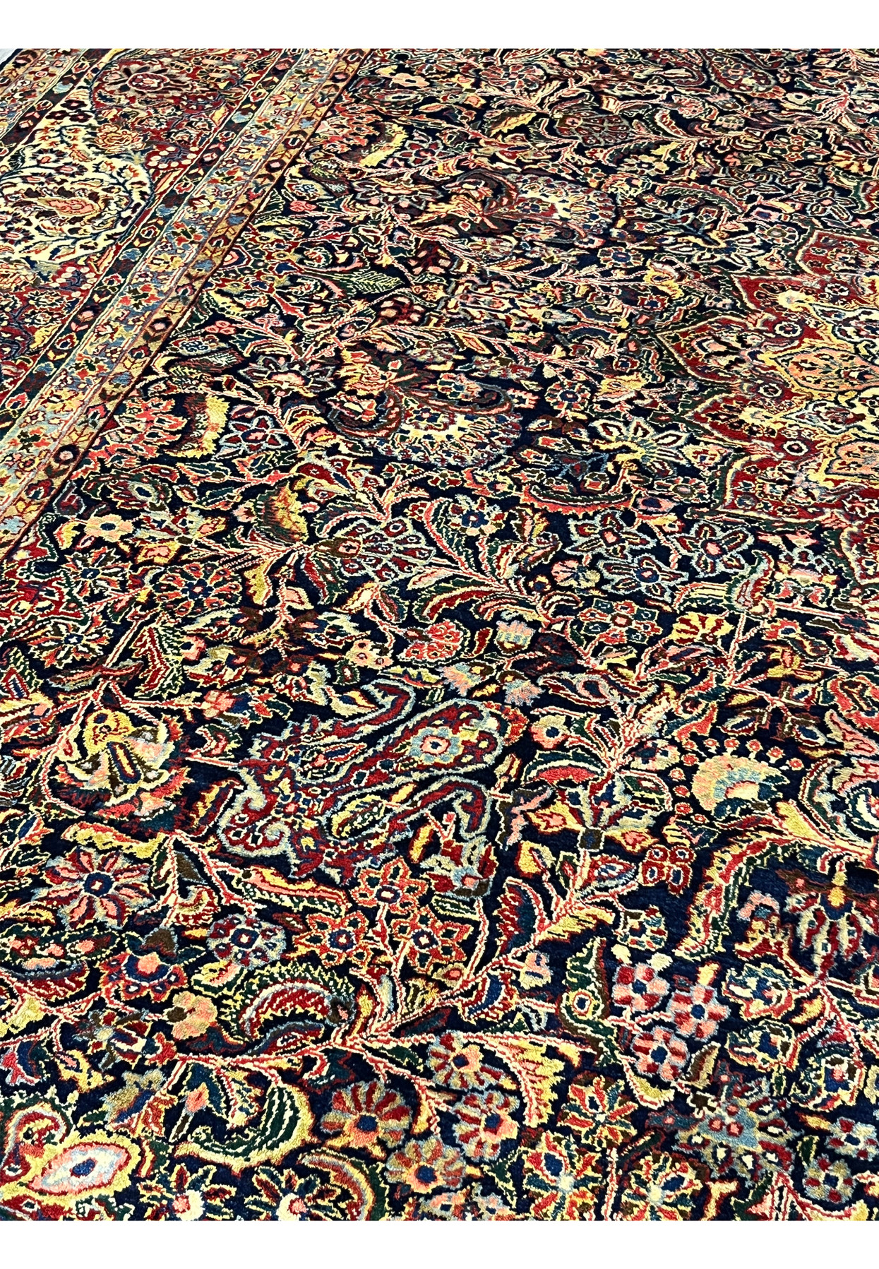Pattern and motif close-up of pre-revolution Sarough, paired palmettes and vine scroll in canary yellow and rose