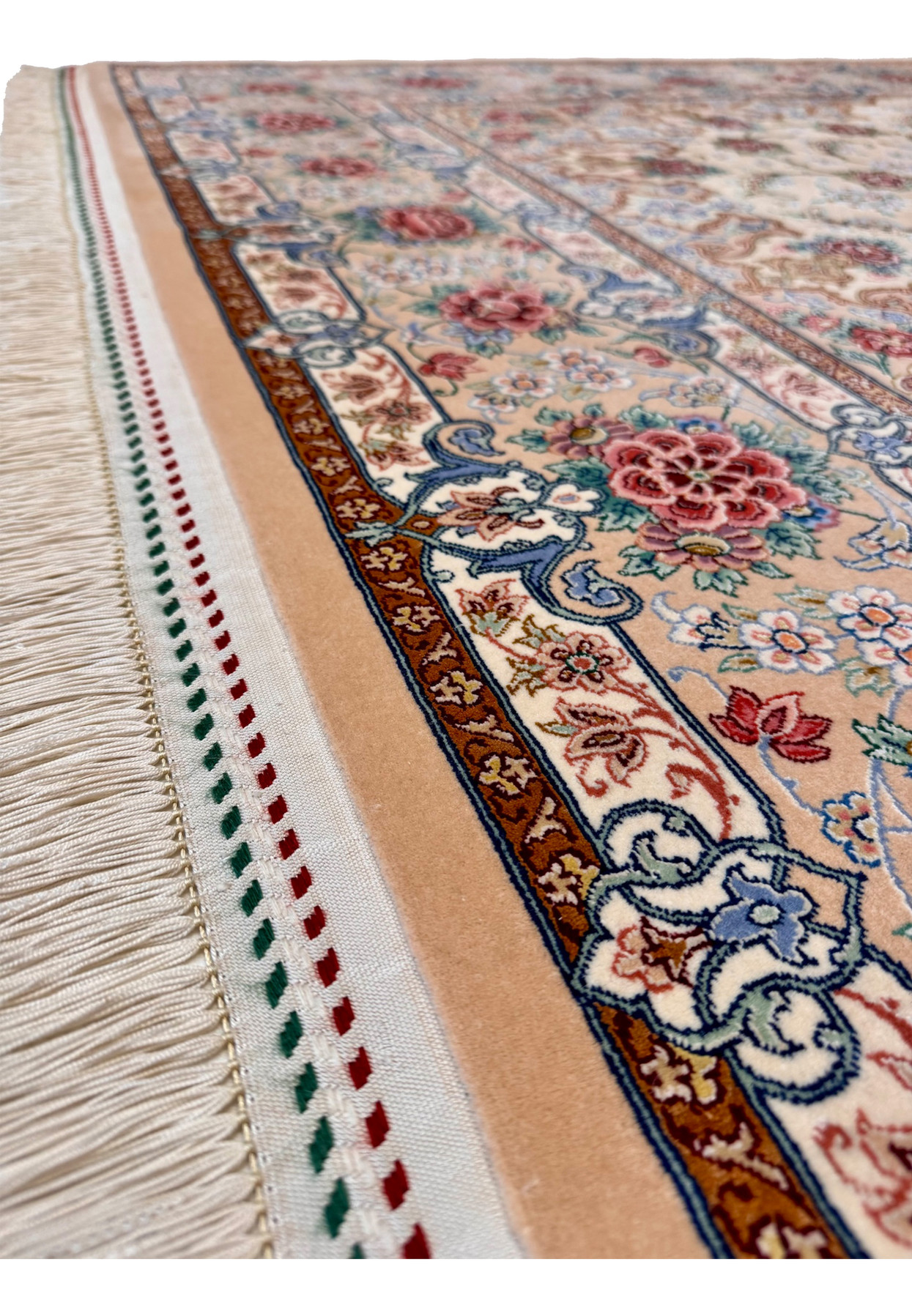 Lower edge of signed Persian Isfahan rug, peach border with rose bouquets and tricolor Iranian flag kilim