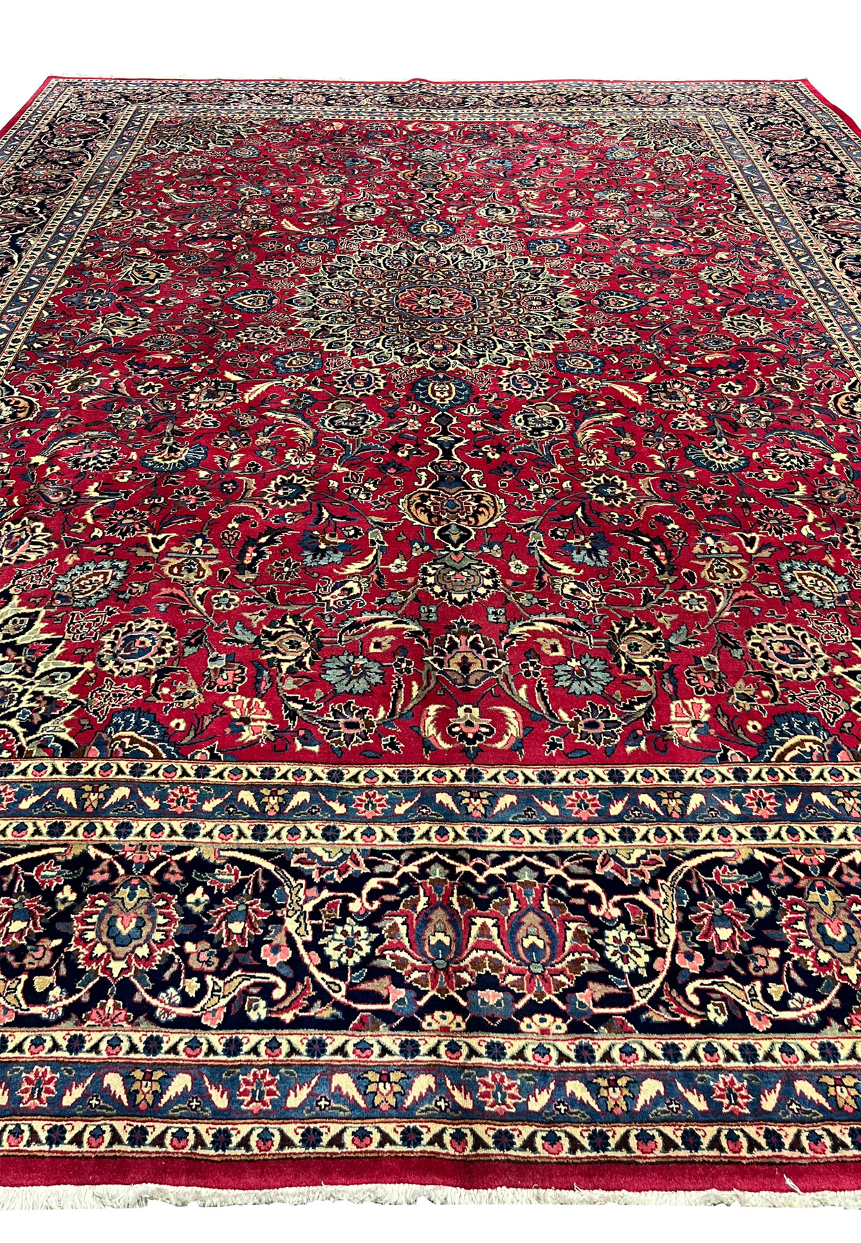 Midfield detail of authentic Persian Mashad rug, allover floral red ground with palmettes and curling vines