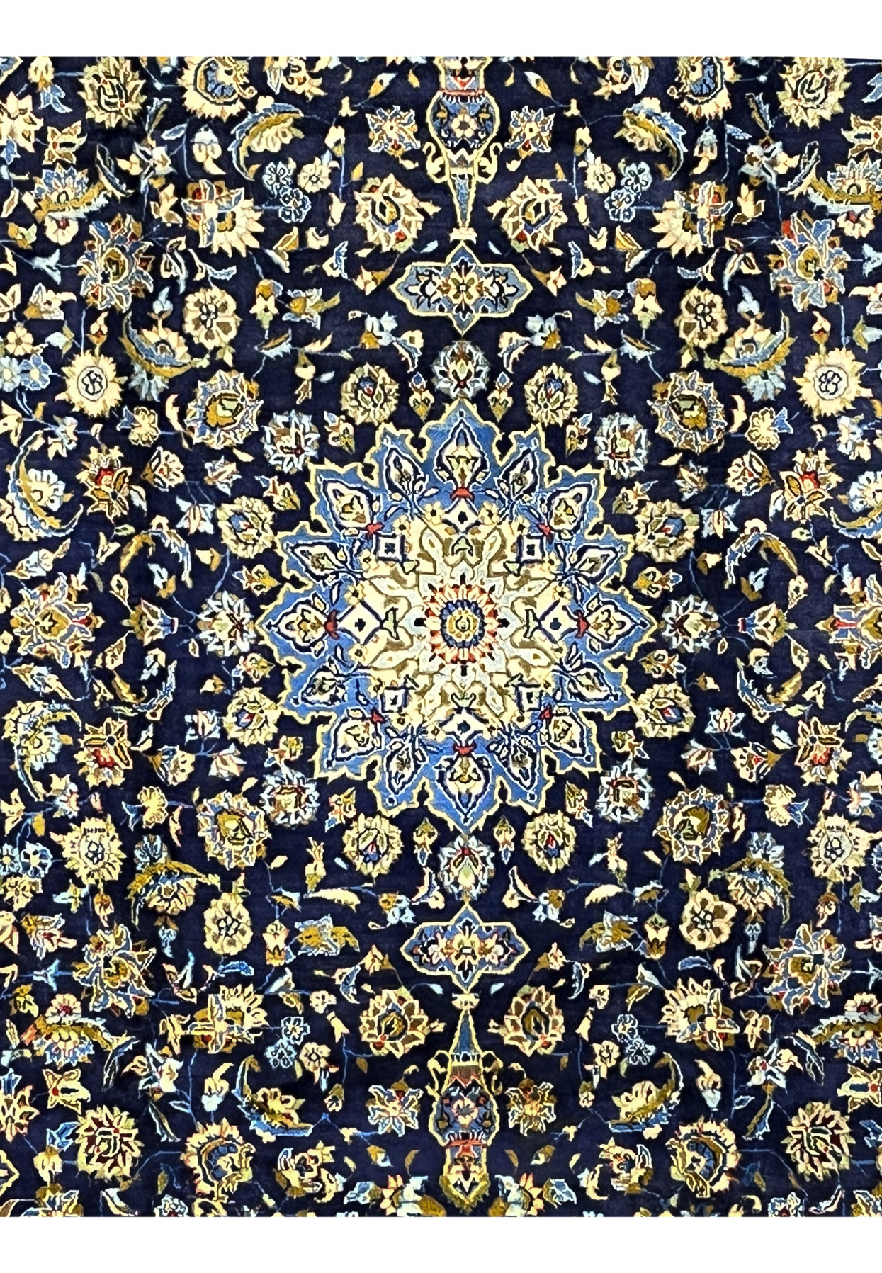 8x11 Persian Kashan rug centered ivory star medallion on midnight navy field with allover florals