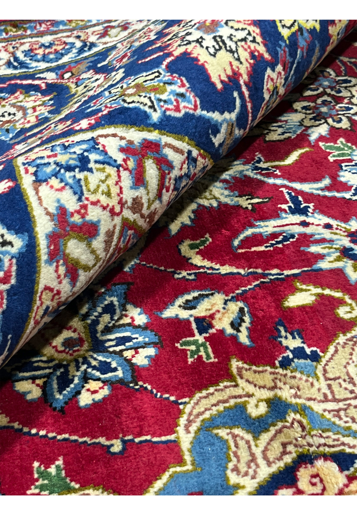 Centered cream star medallion on red Persian Najafabad rug framed by Shah Abbas florals and vine scrolls