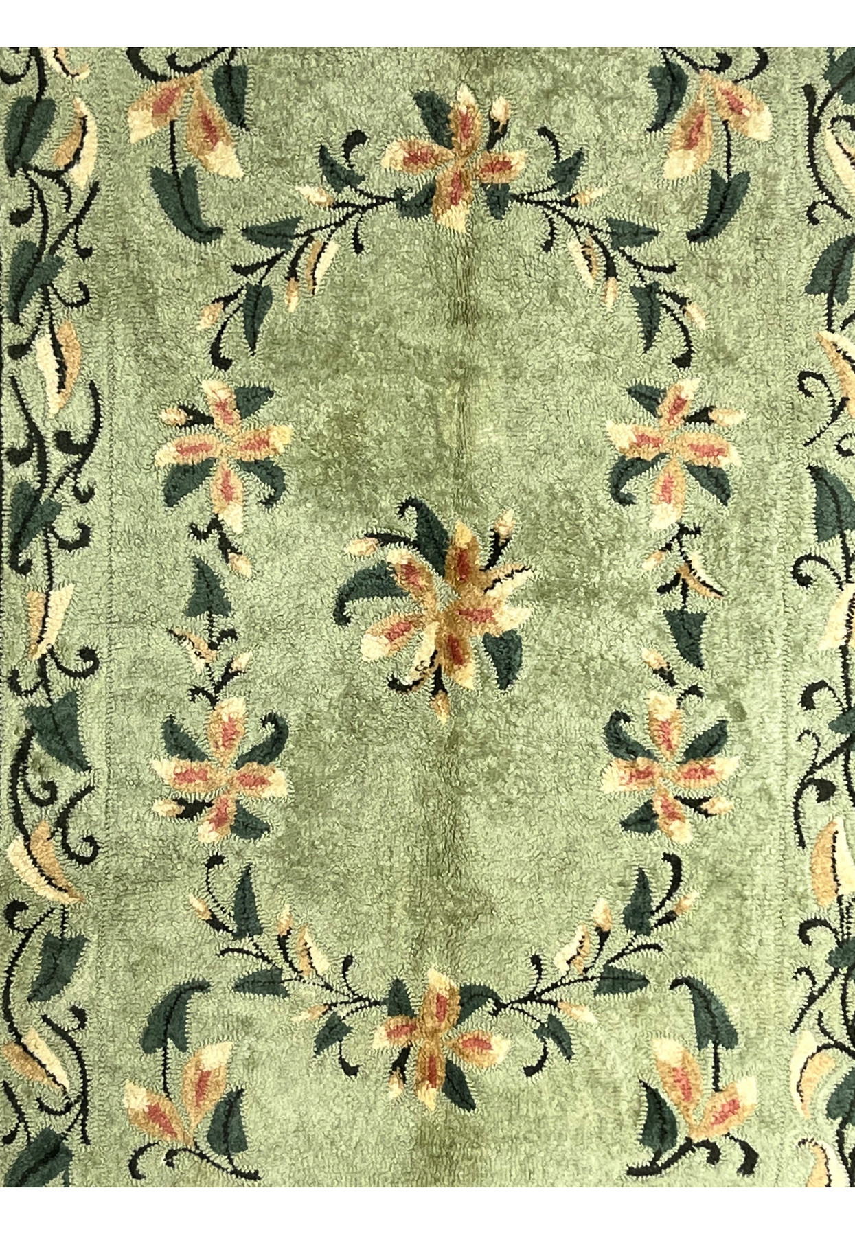 6x9 vintage hand-hooked wool rug midfield with cream and peach flowers on sage green ground