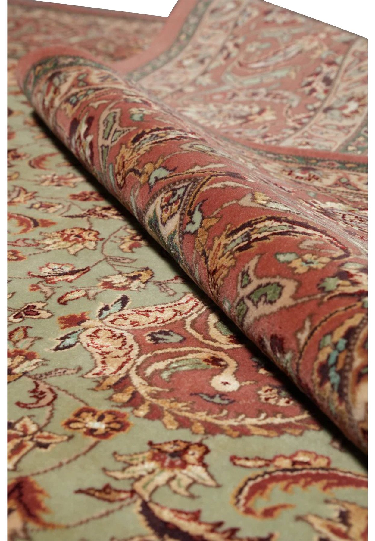 Persian Isfahan wool and silk rug rolled, sage-green field with fine silk-highlighted weave