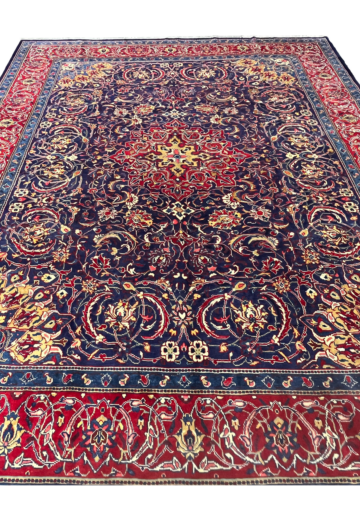 10x13 Persian Mahal rug, navy field with red border and allover floral design, hand-knotted wool