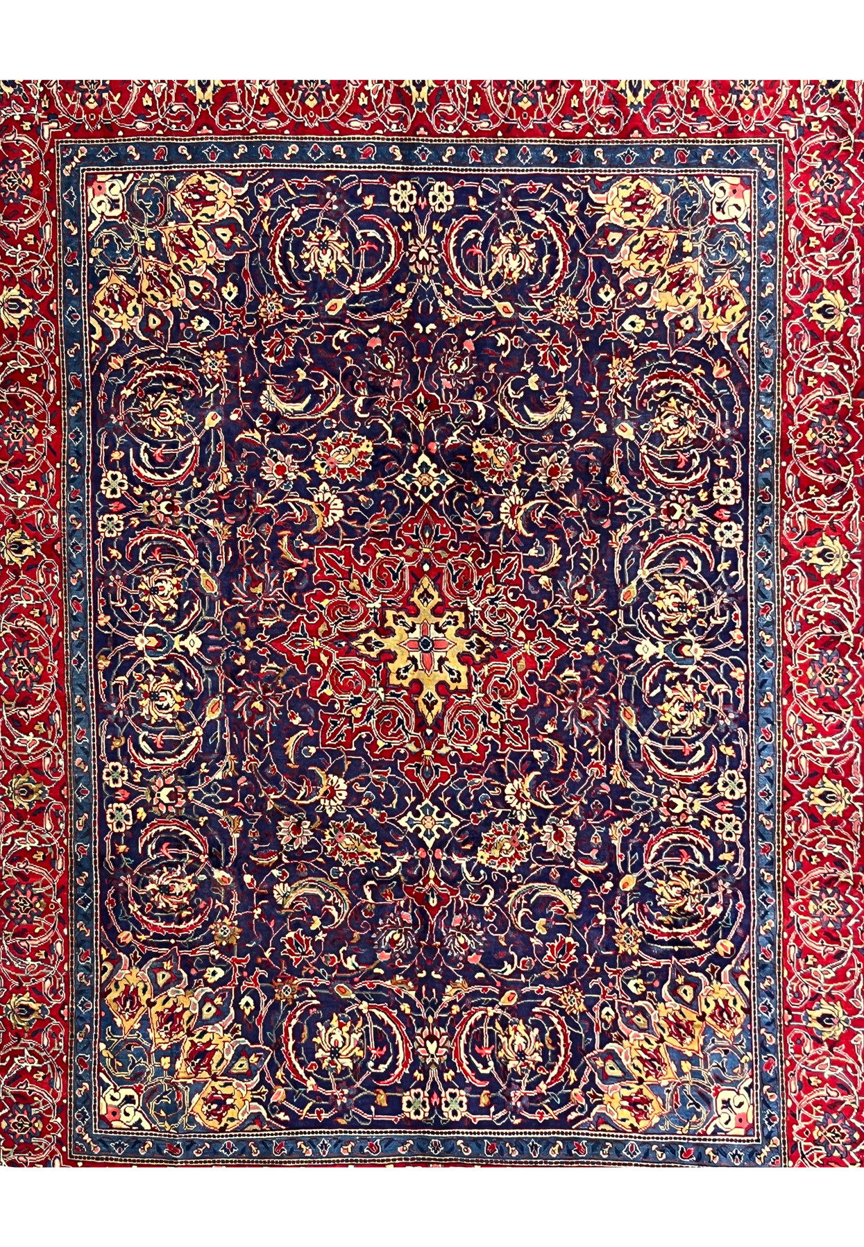 Navy field of Persian Mahal with large curved palmettes, vine scrolls, and ivory rosettes