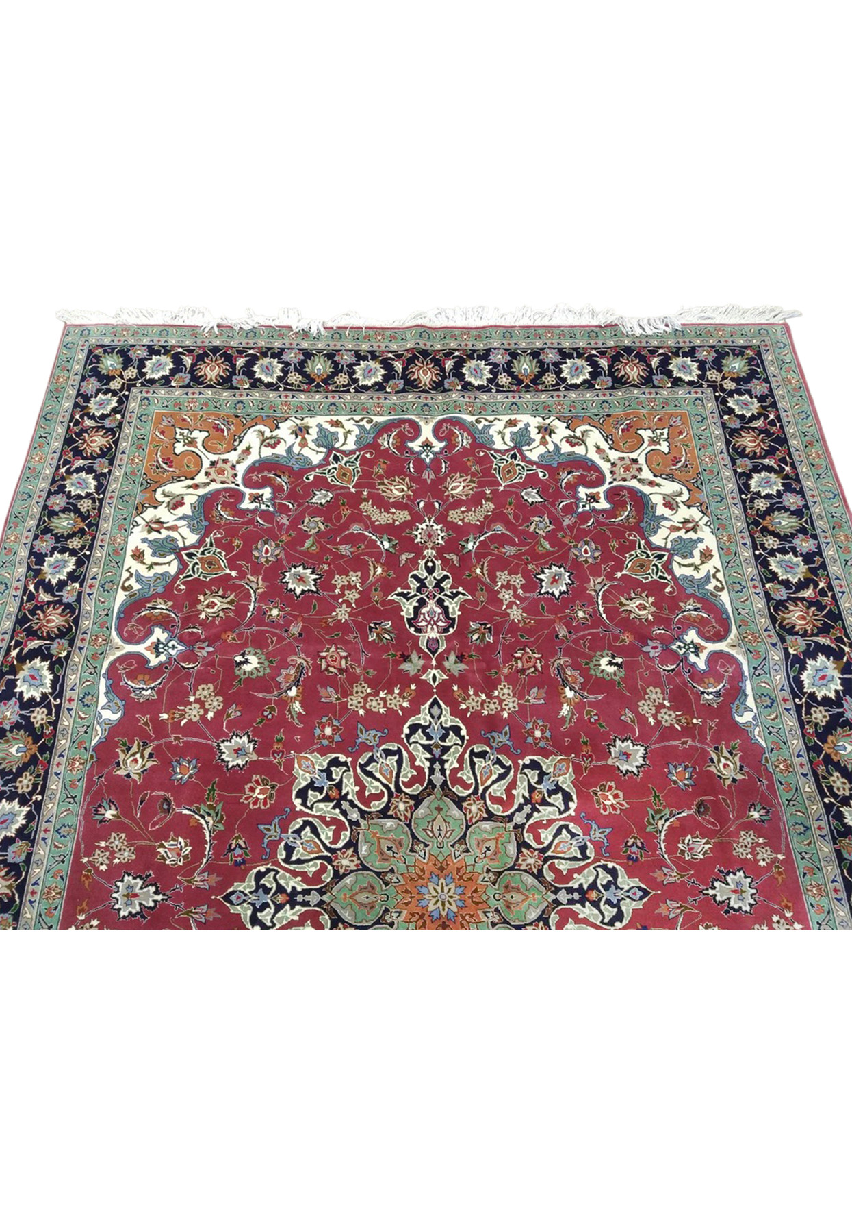 Upper section of Persian Tabriz 60 raj rug showing ivory spandrels with rust accents and detailed pendant cartouche