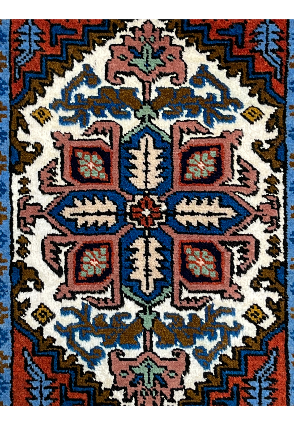 Central stepped geometric medallion of Persian Ardebil baby rug, ivory ground with mauve cartouches and mint accents