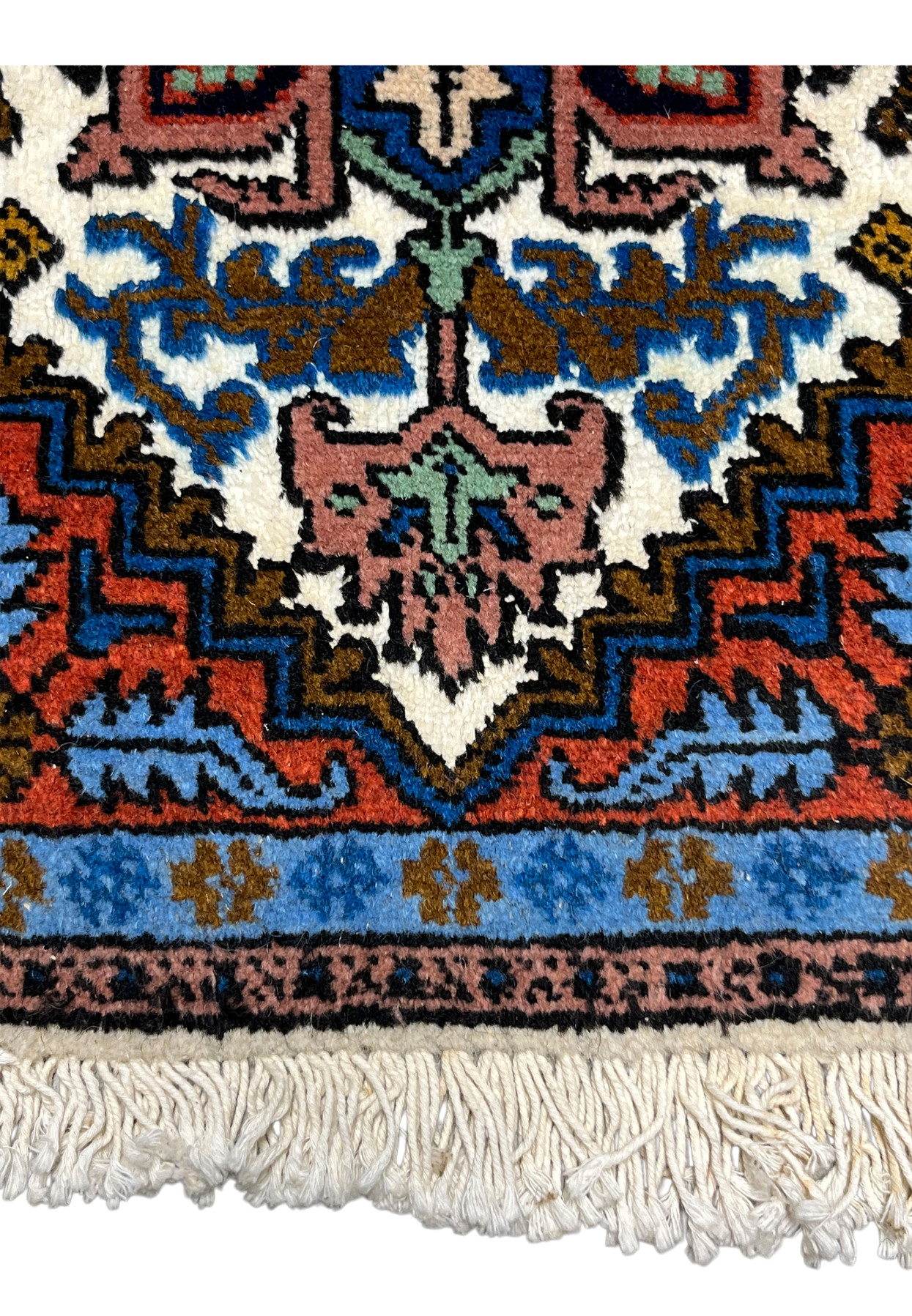 Lower section of Persian Ardebil baby rug, ivory medallion edge with sky blue corner bracket on rust field