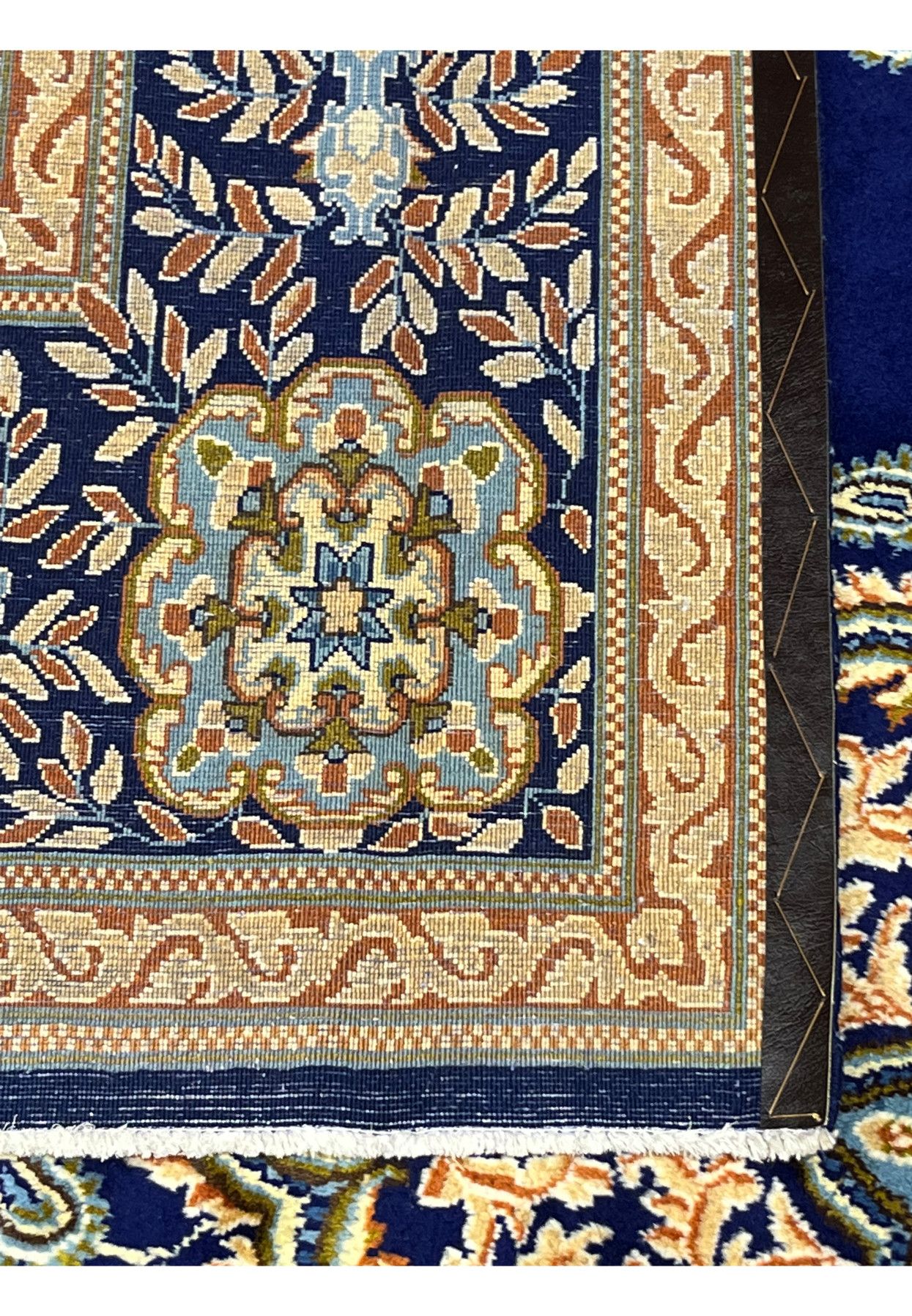 Reverse view of Persian Yazd rug showing 280 to 300 KPSI hand-knotted wool weave on cotton foundation