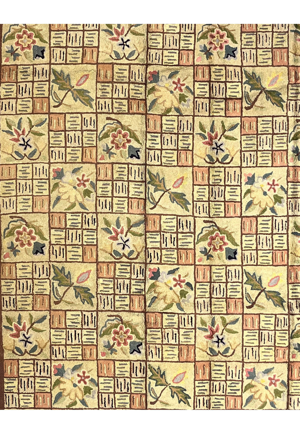 Garden tile field of the hand-hooked rug with star flowers oak leaves and hash mark squares
