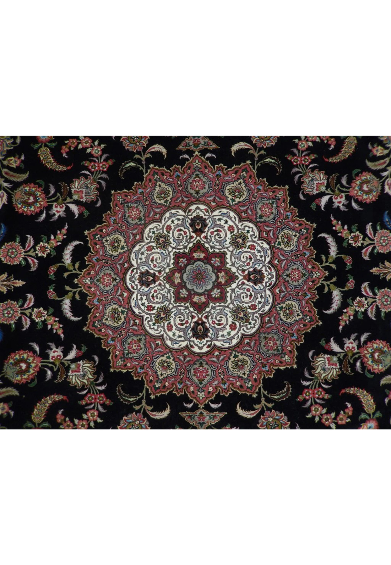 Layered ivory and rose star medallion with arabesque scrollwork at the Tabriz center