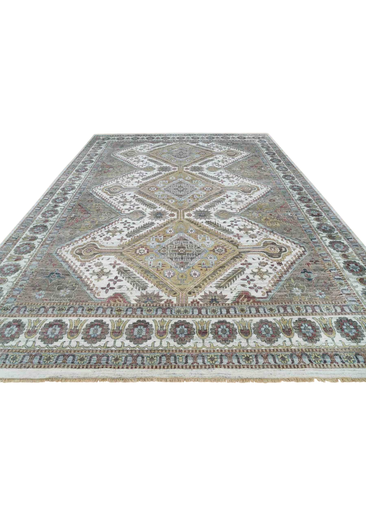 13'8" x 17'9" oriental Shiraz rug laid flat, ivory and grey field with three geometric diamond medallions